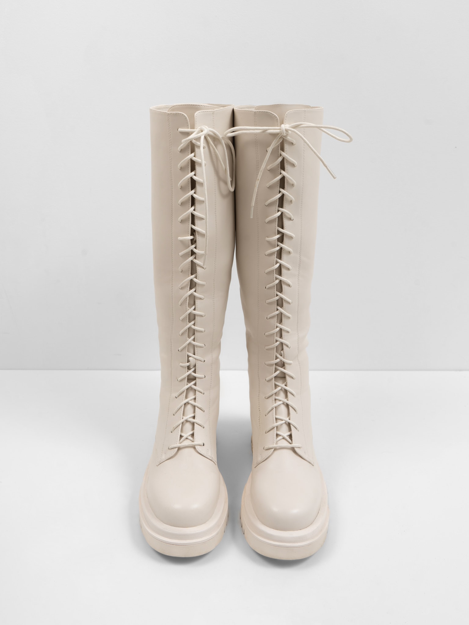 Knee-high lace-up boots