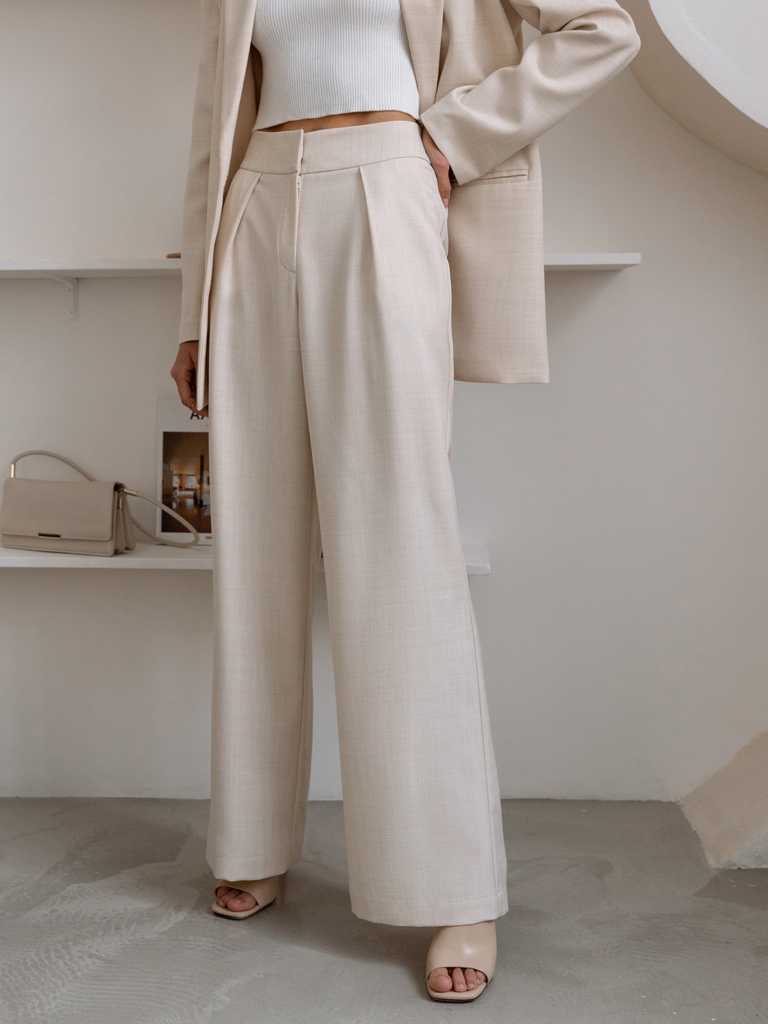 Loose-fitting trousers with a wide belt :: LICHI - Online fashion store