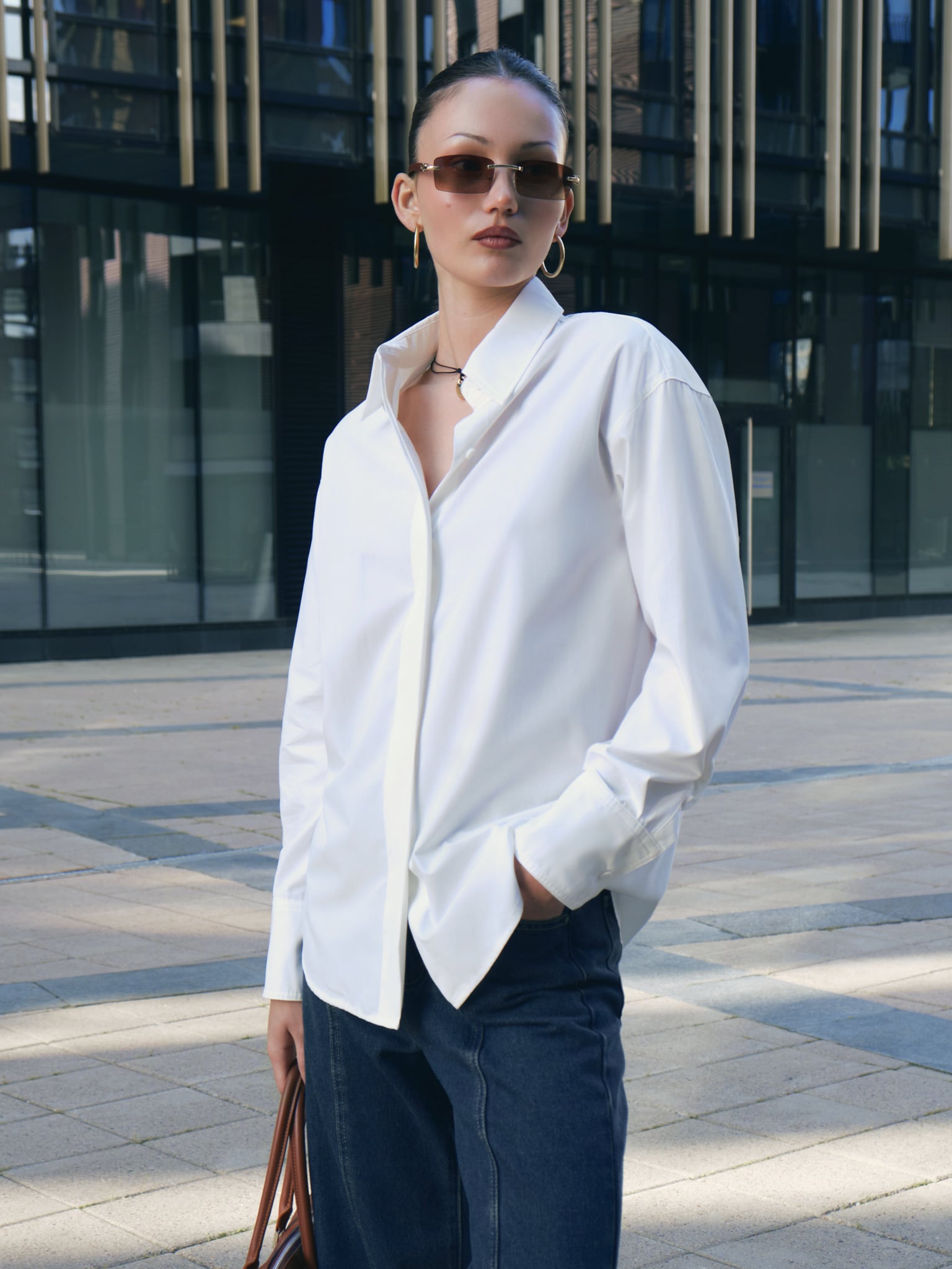 Loose cut shirt with concealed buttons