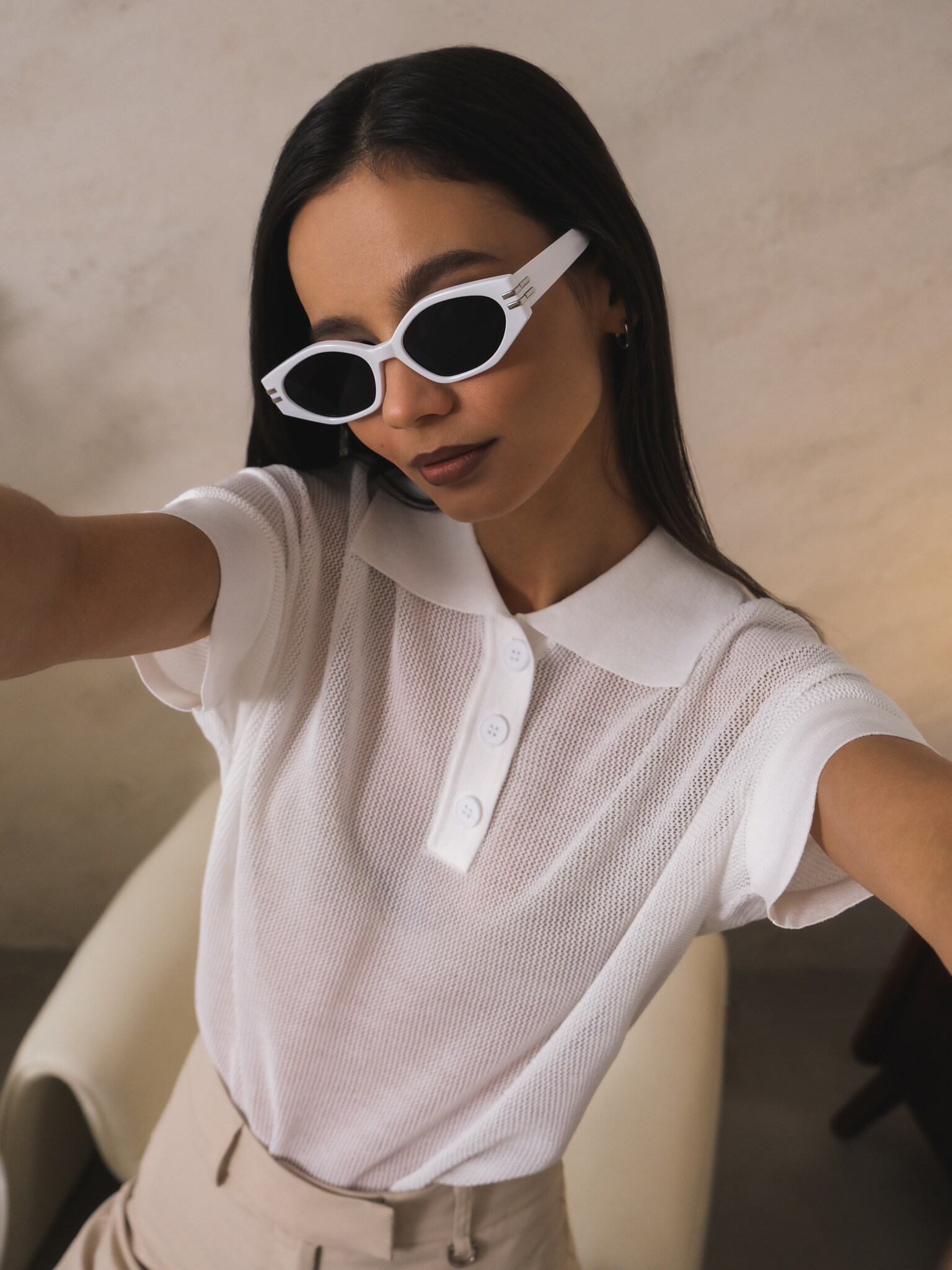 Oval sunglasses in a plastic frame