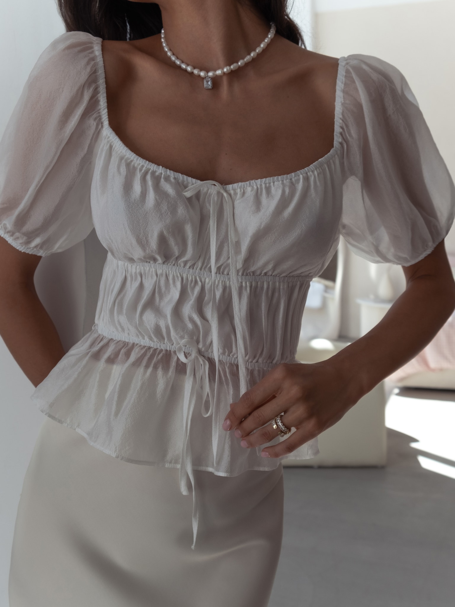 Lightweight top with horizontal pleats