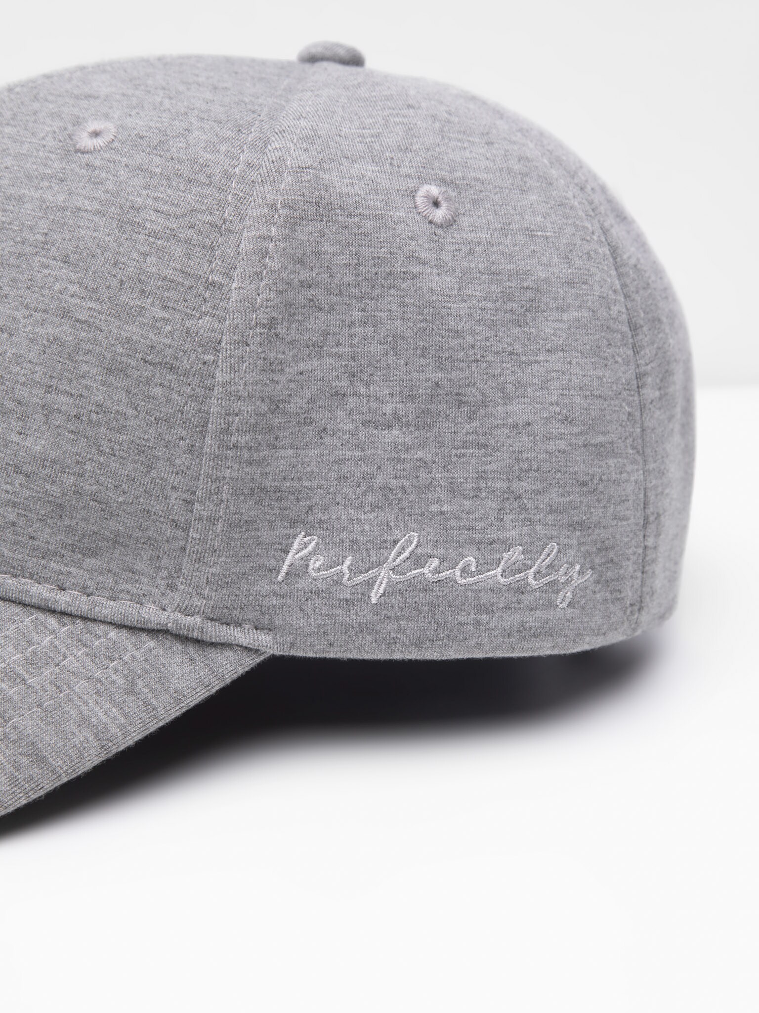 Cap with embroidery on the side