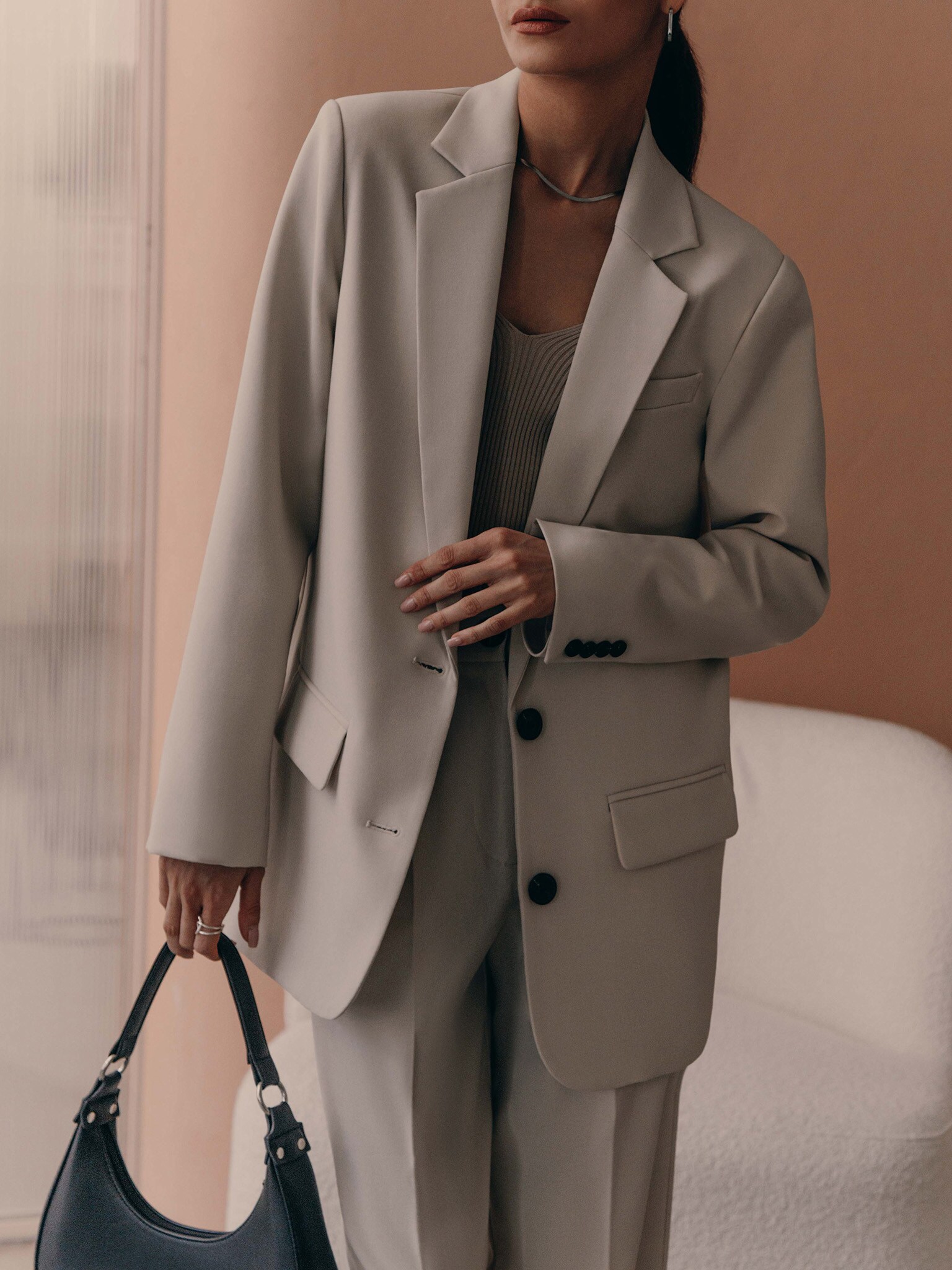 Veste à boutonnage simple avec boutons d'accent