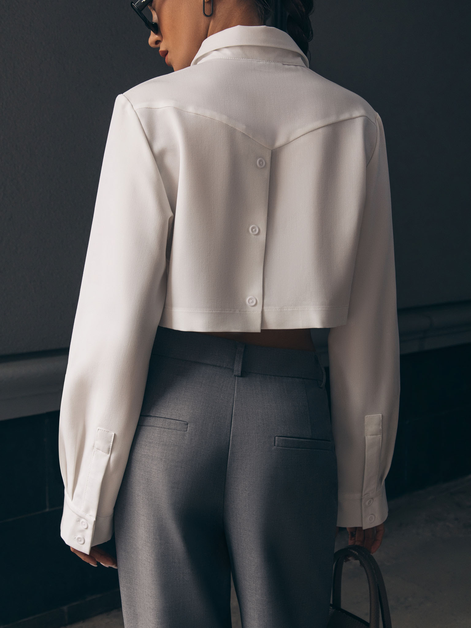 Cropped shirt with asymmetric bottom edge