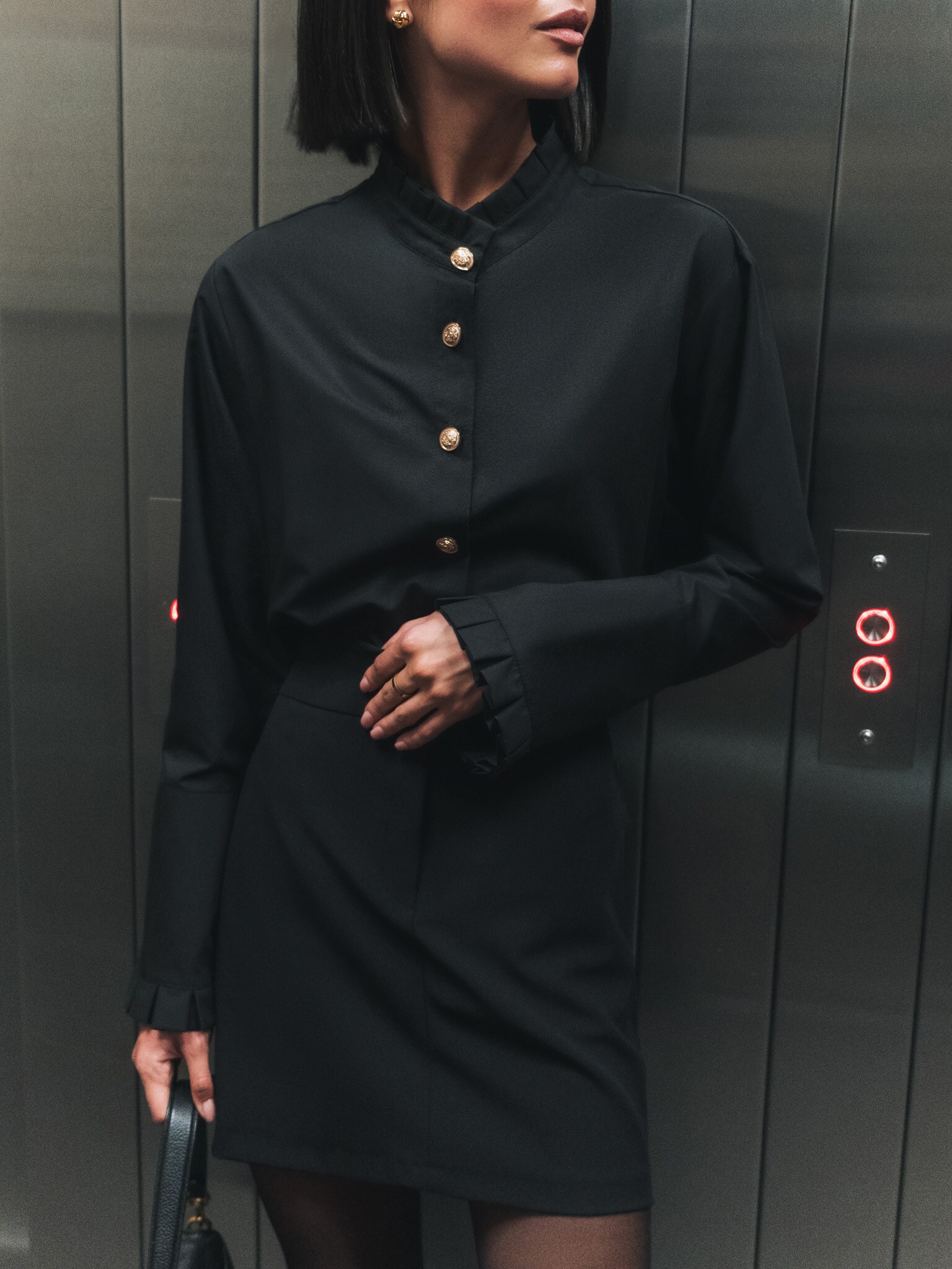 Stand-up collar shirt with golden buttons