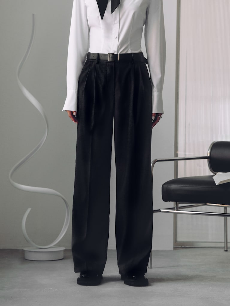 Trousers with a wide eco-leather belt