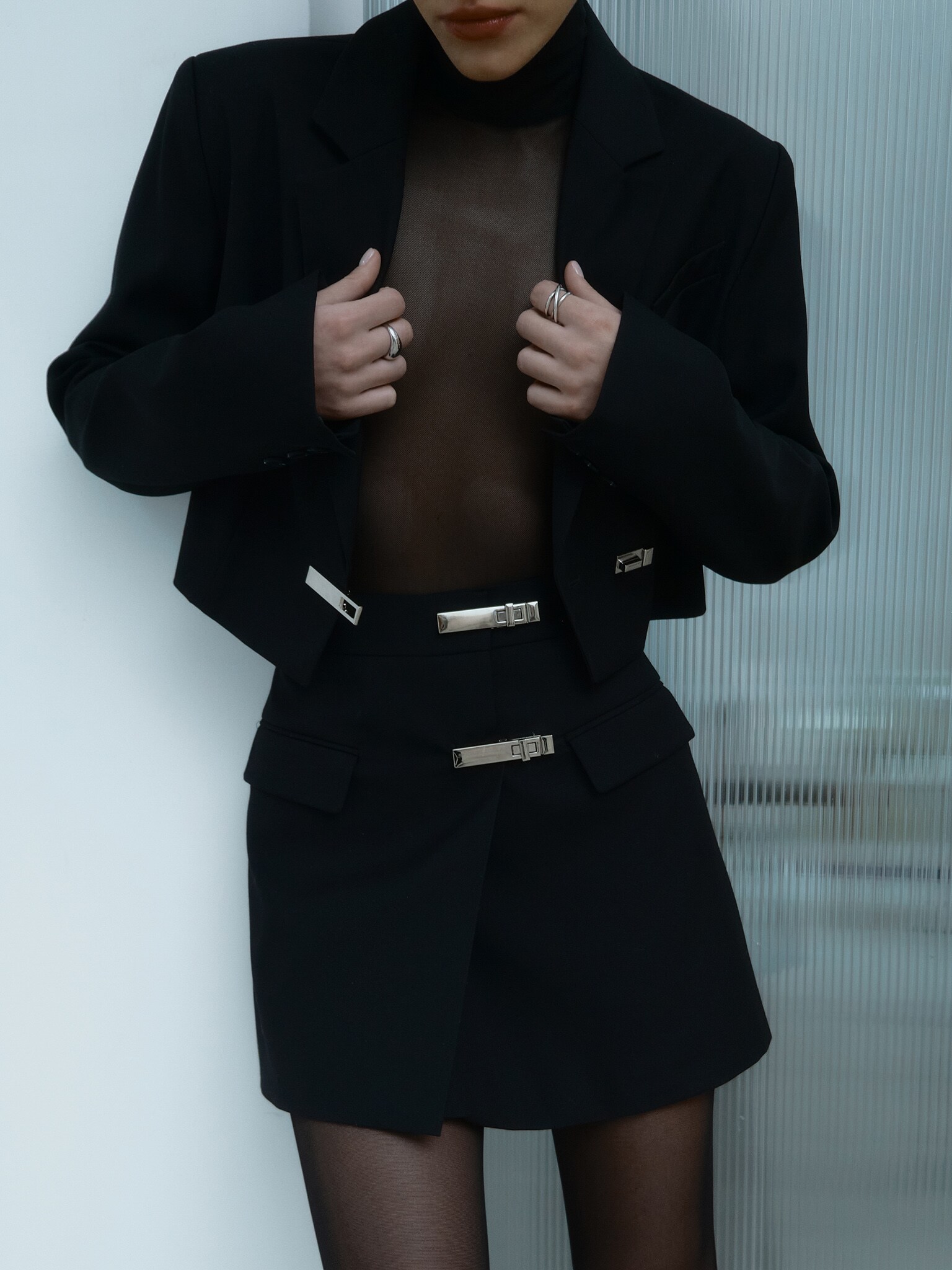 Cropped jacket with turn lock clasp