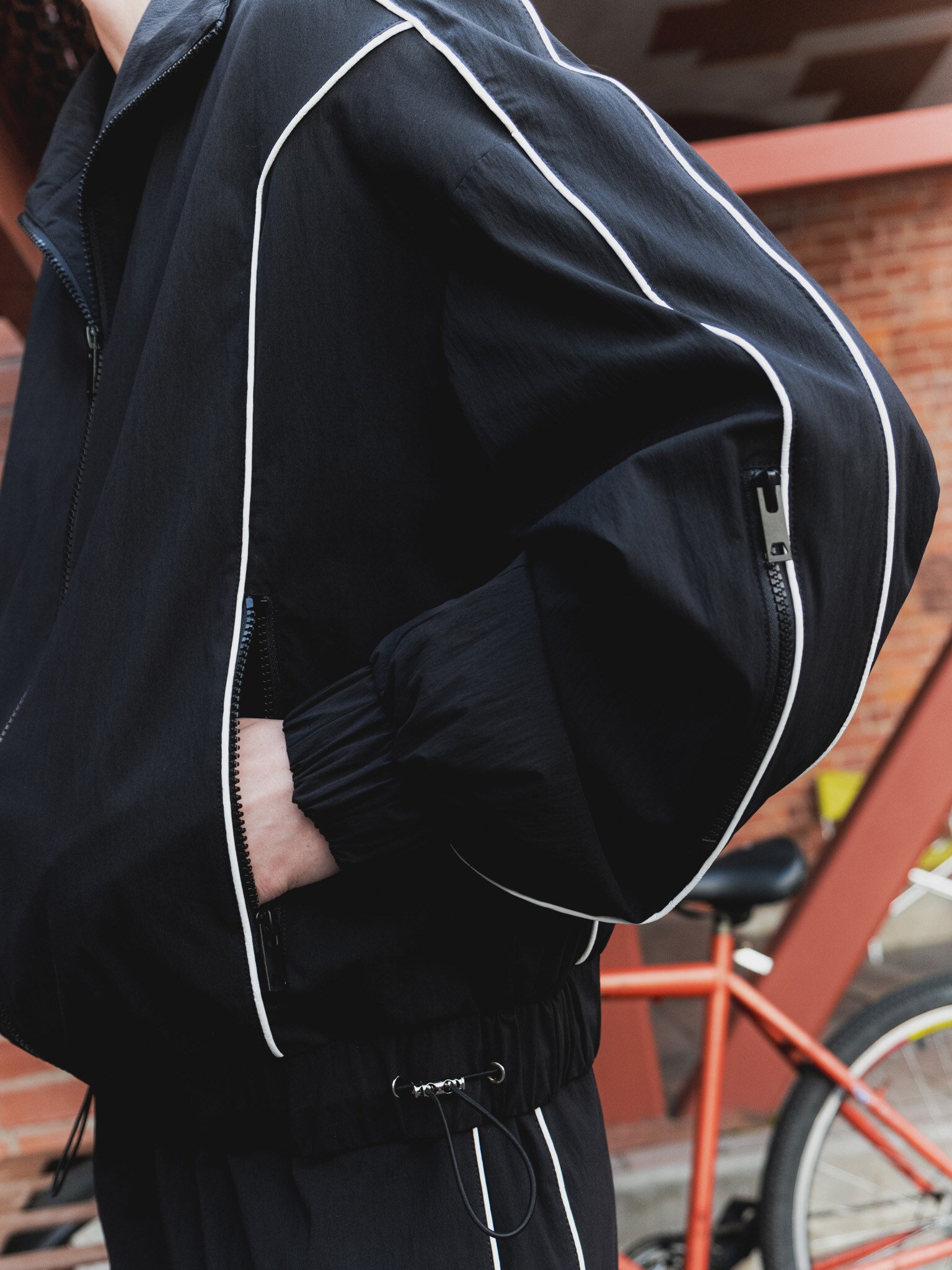 Nylon windbreaker with contrasting stripes