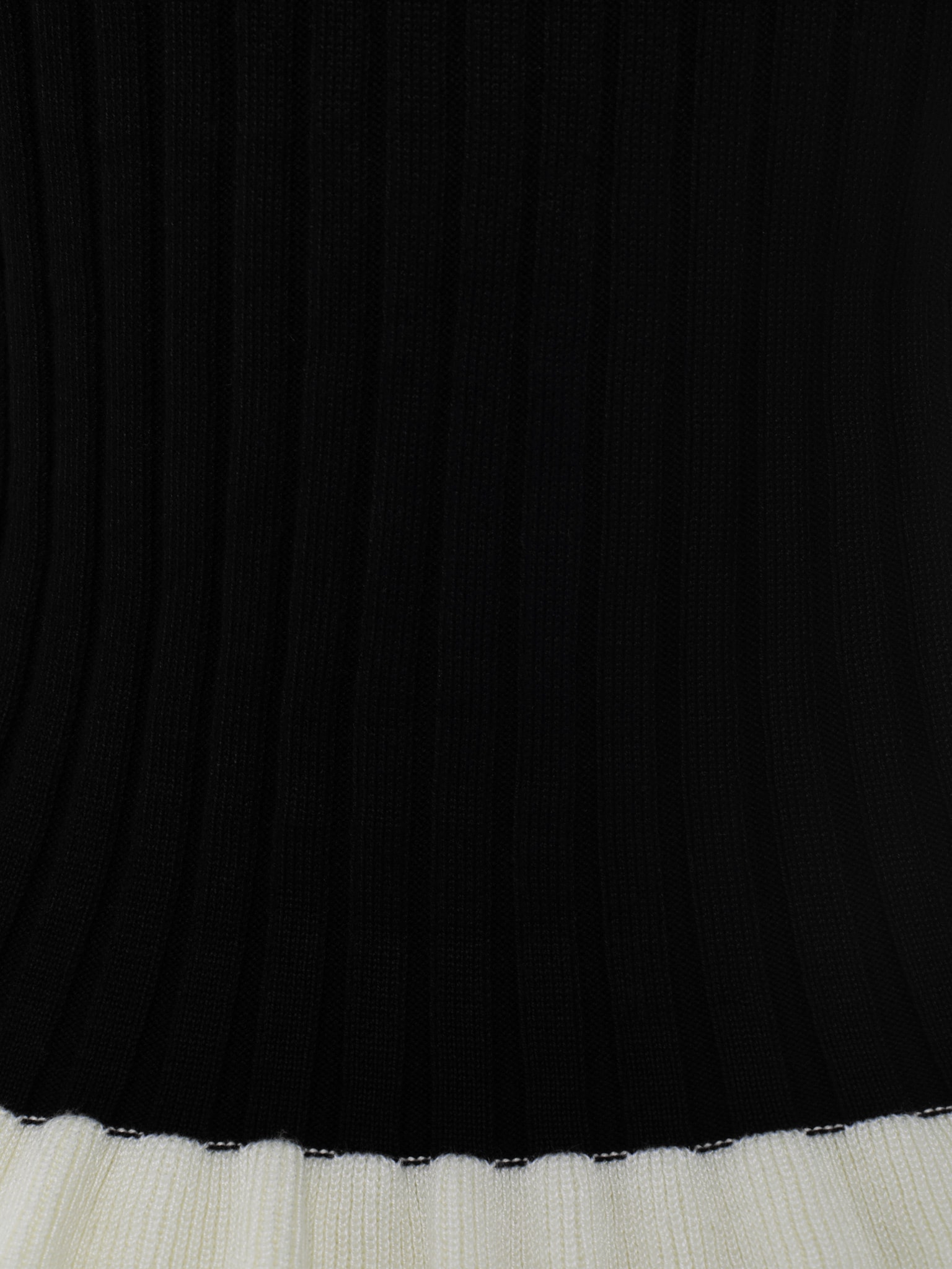 Rib-knit cardigan with contrasting ruffles