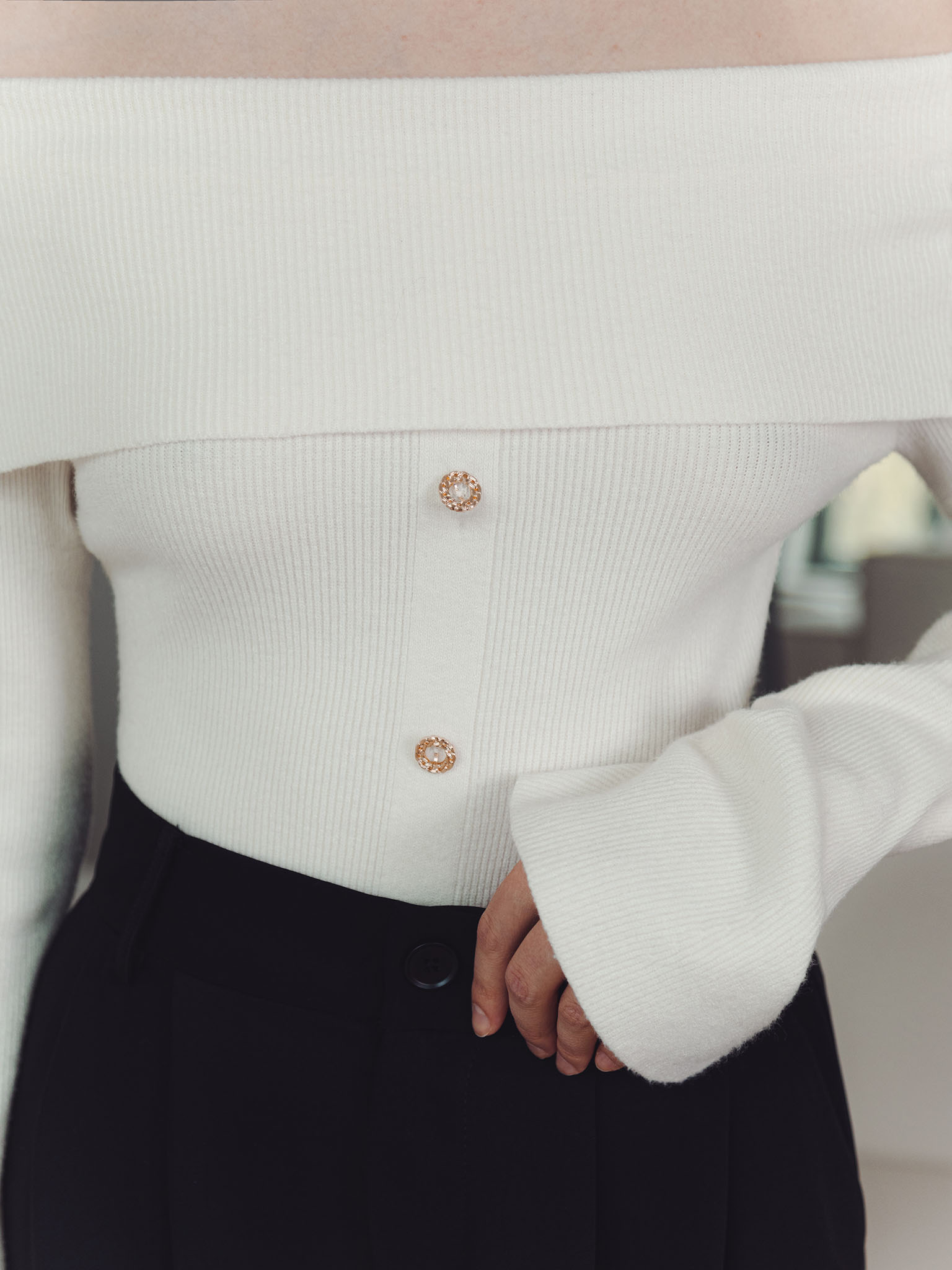 Open shoulders top with decorative buttons