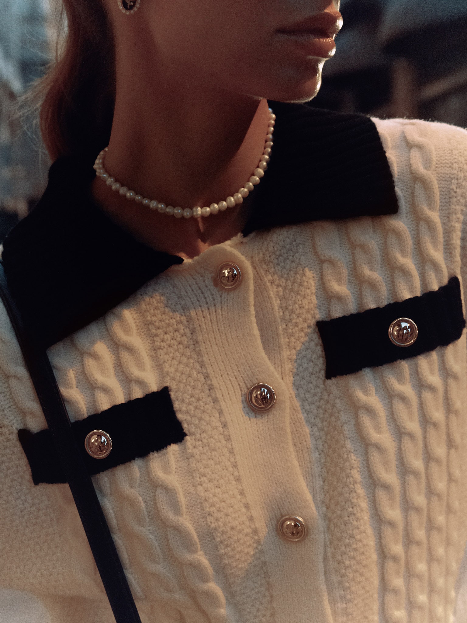 Cable knit cardigan with contrasting details