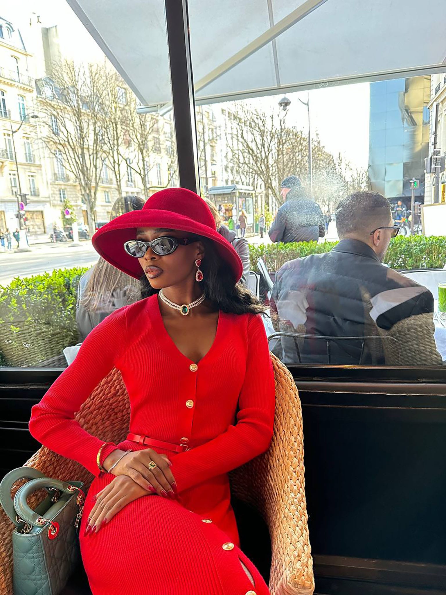 Knitted midi dress with a belt and golden decorations