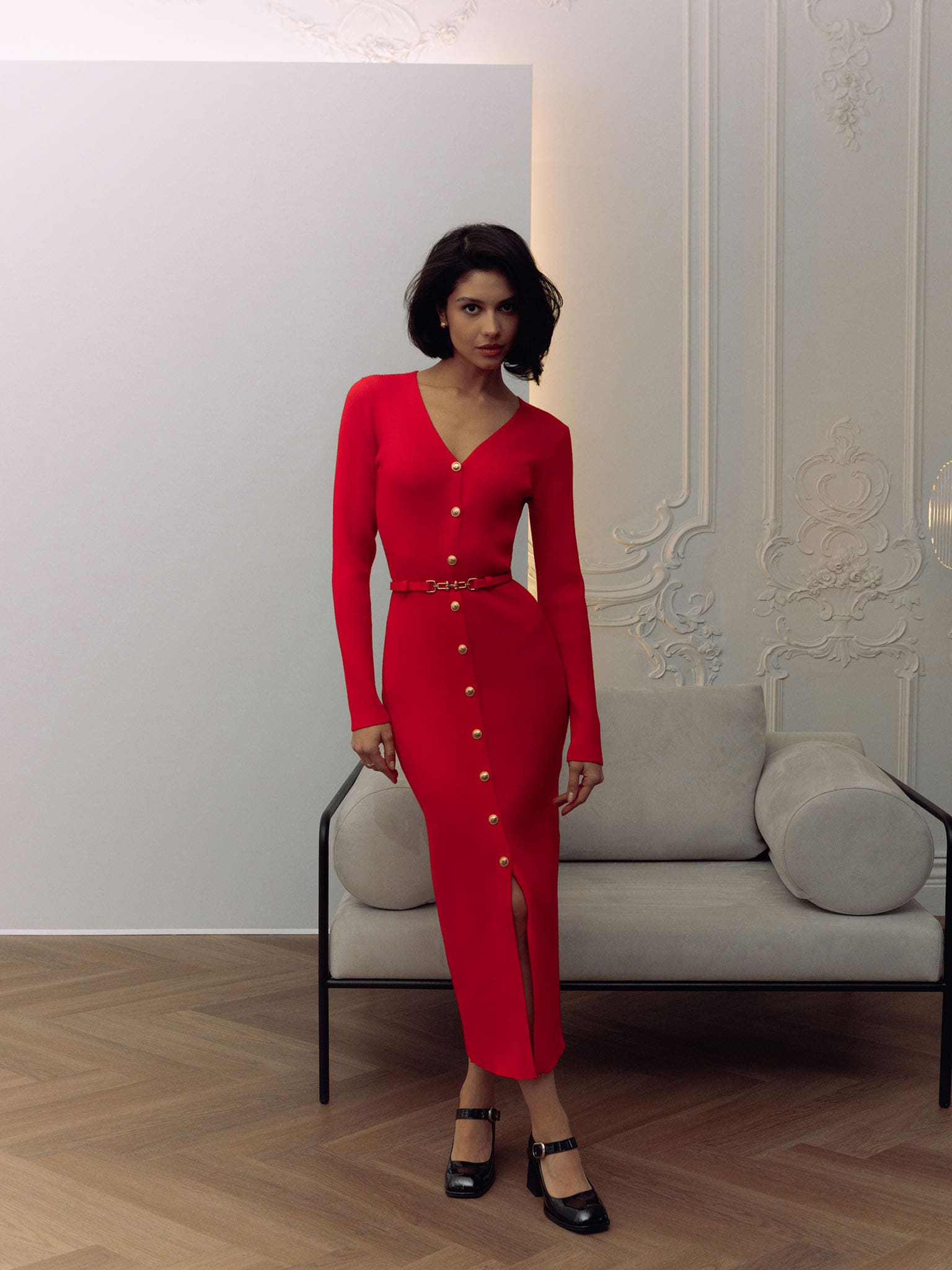 Knitted midi dress with a belt and golden decorations