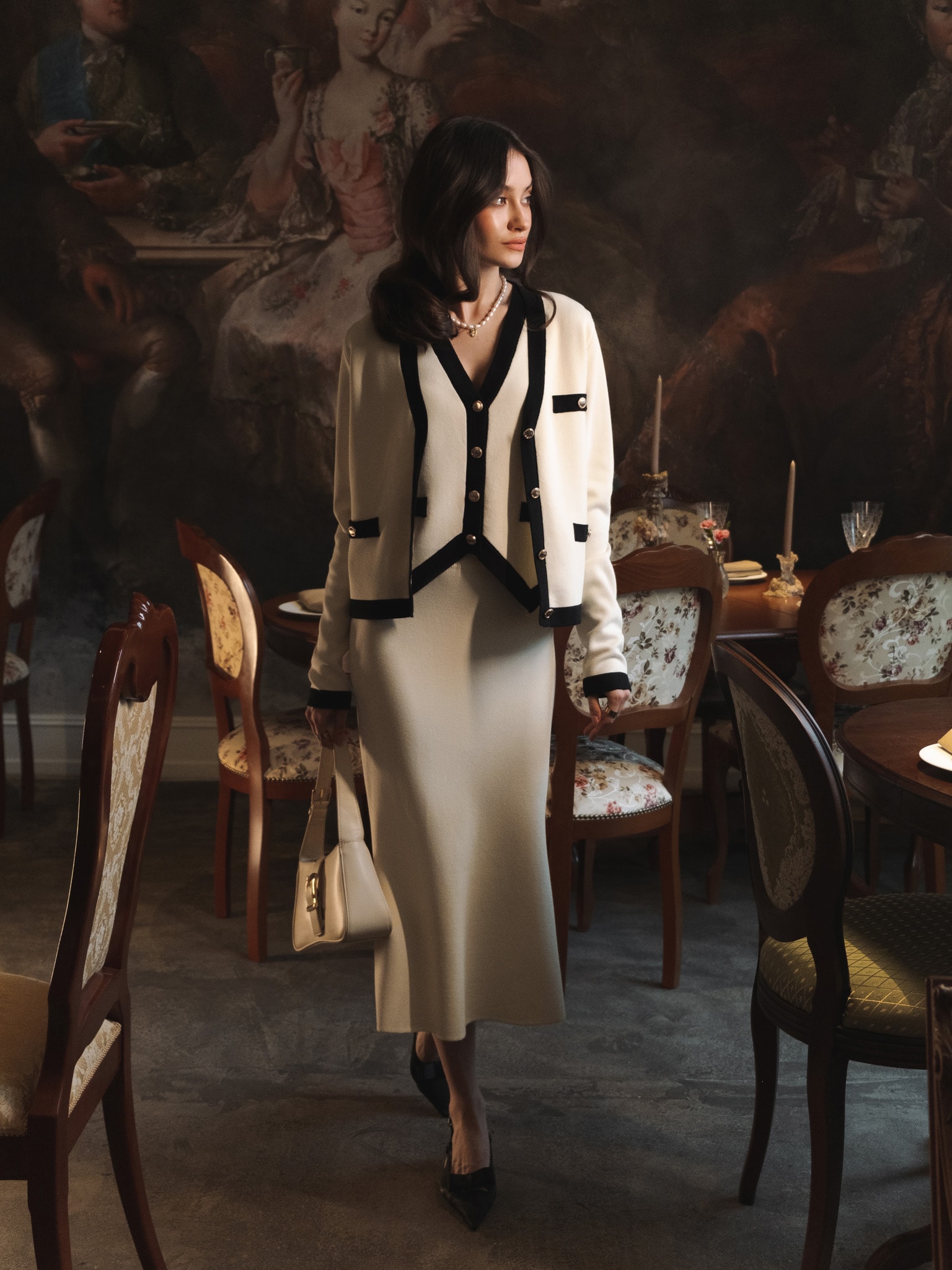 Knitted cardigan with golden buttons