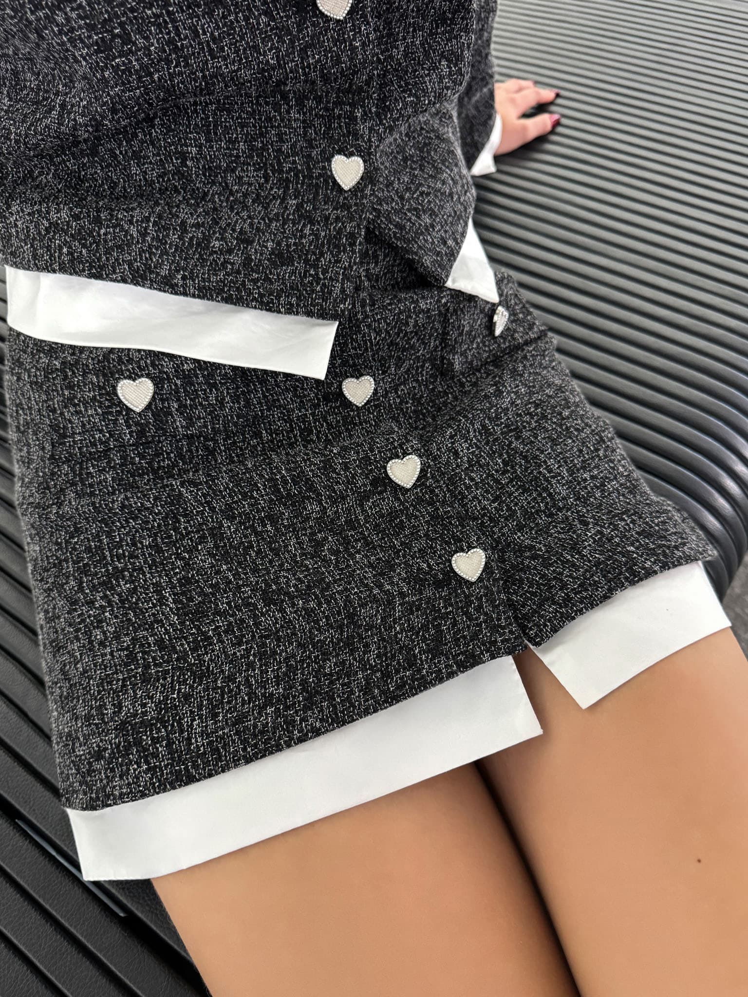 Mini skirt with heart-shaped buttons