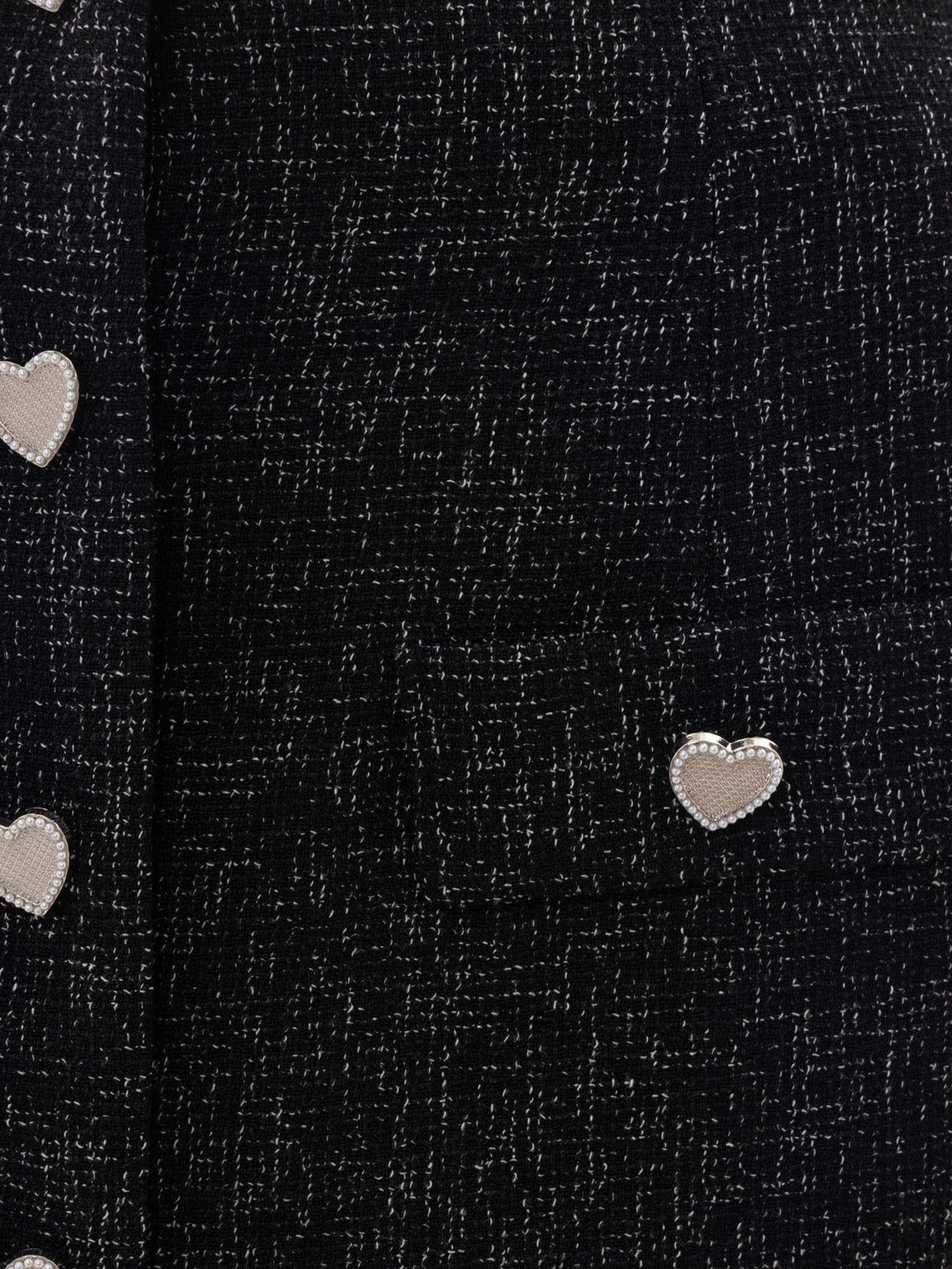 Mini skirt with heart-shaped buttons