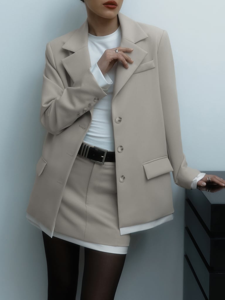 سترة أحادية الصدر مع إدراجات متباينة