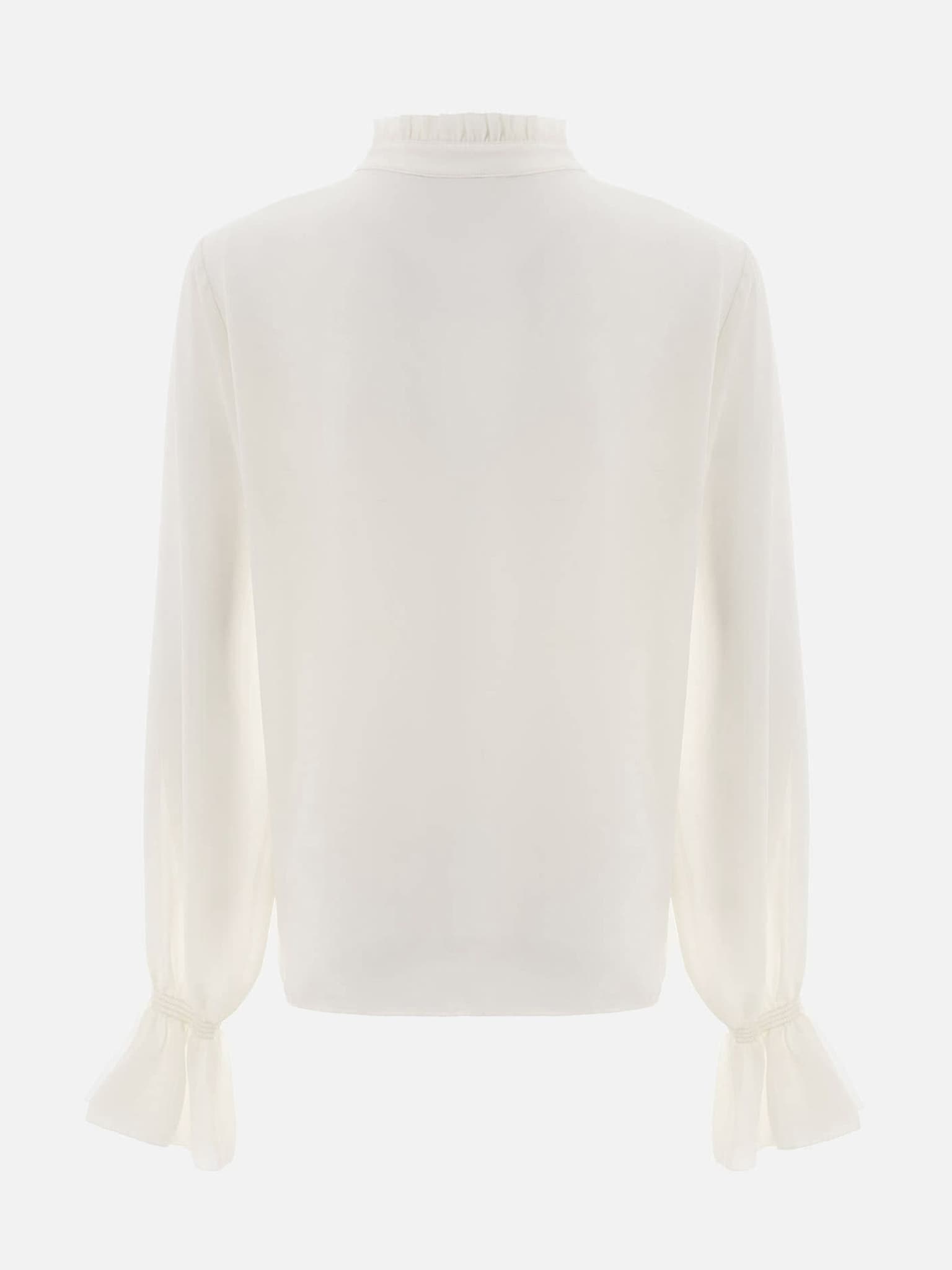 Light blouse with flounces and ties at the collar