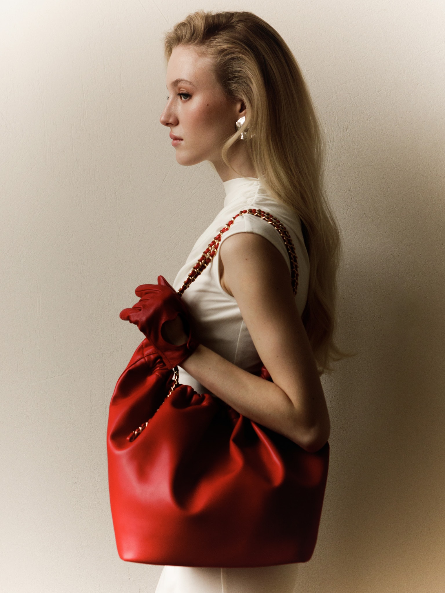 Soft-shaped bag with chain decor on the handles :: LICHI Online