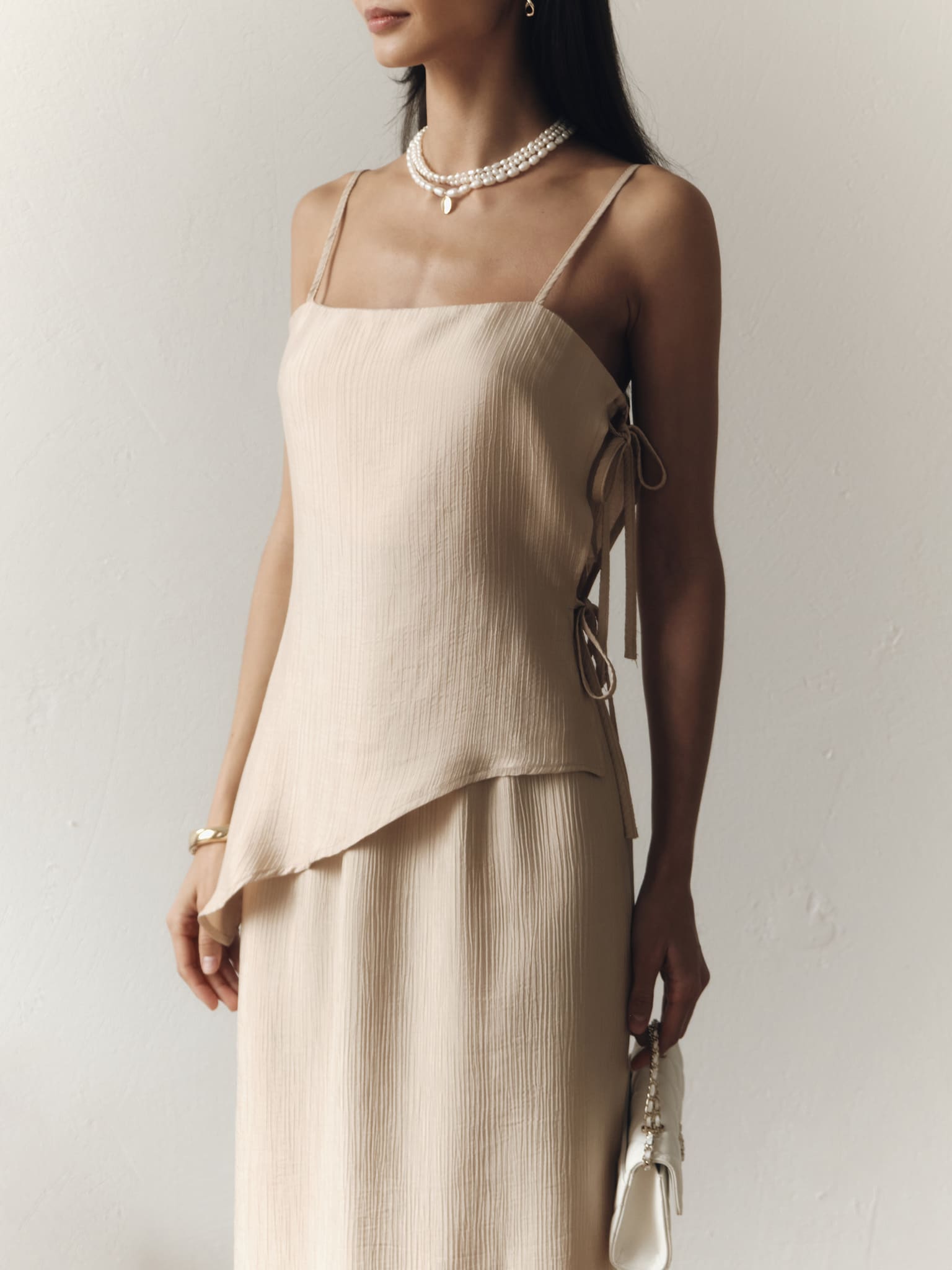 Top na ramiączkach z wiązaniami po bokach