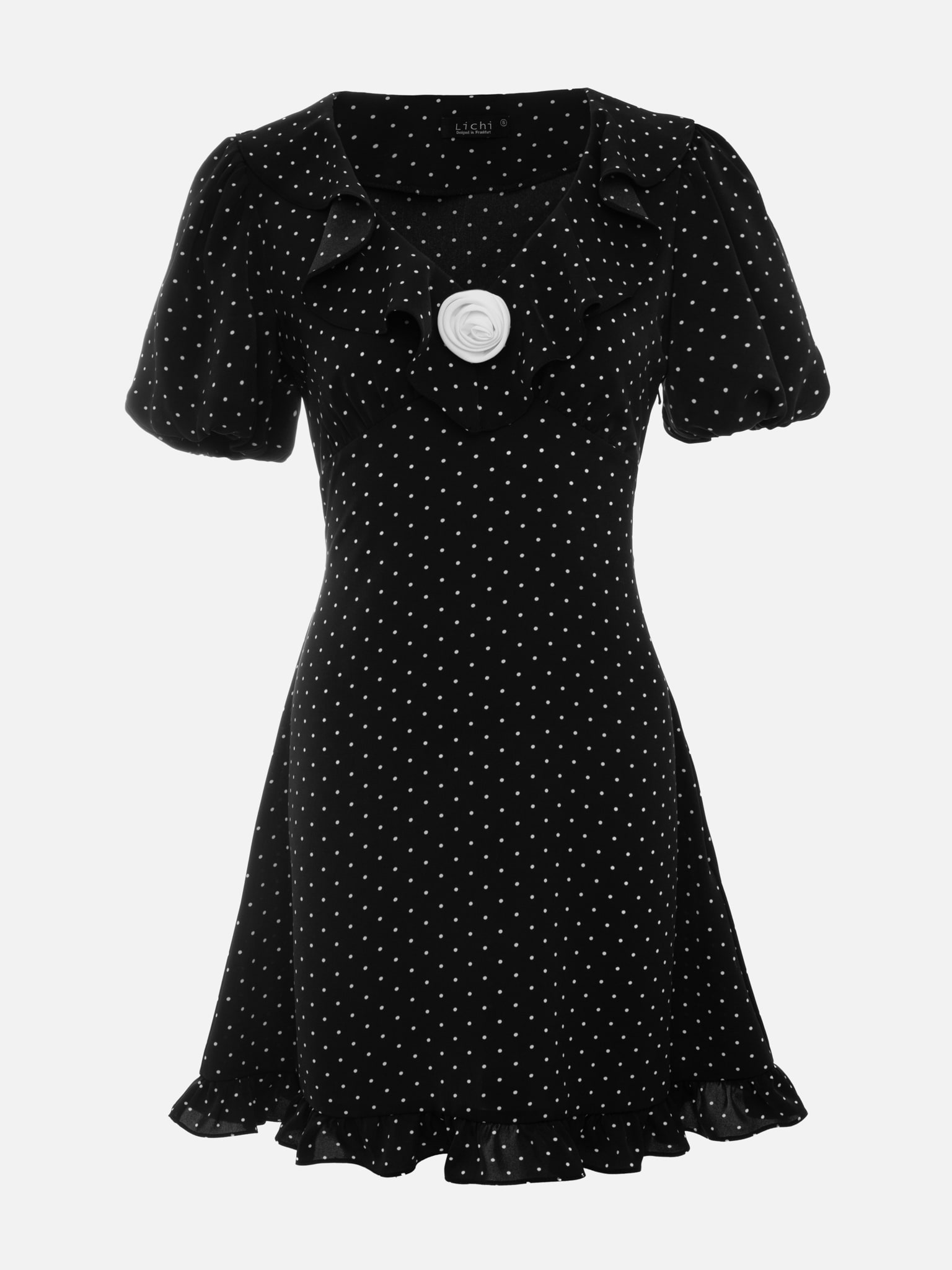 Mini polka-dot dress with contrasting flower