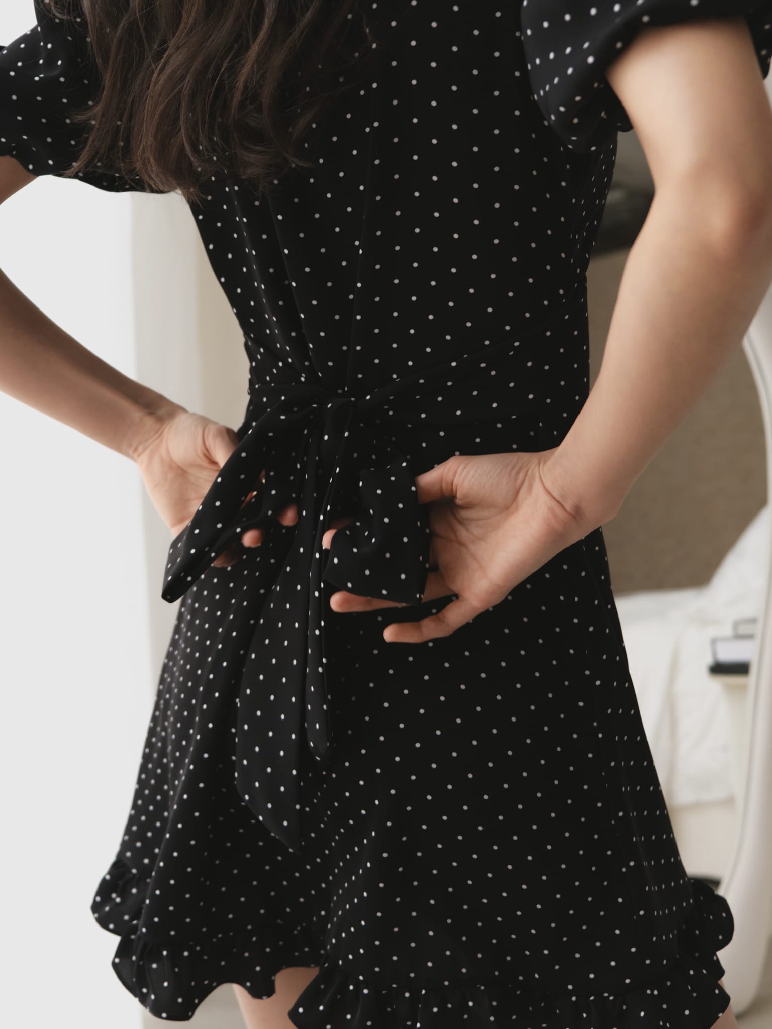 Mini polka-dot dress with contrasting flower
