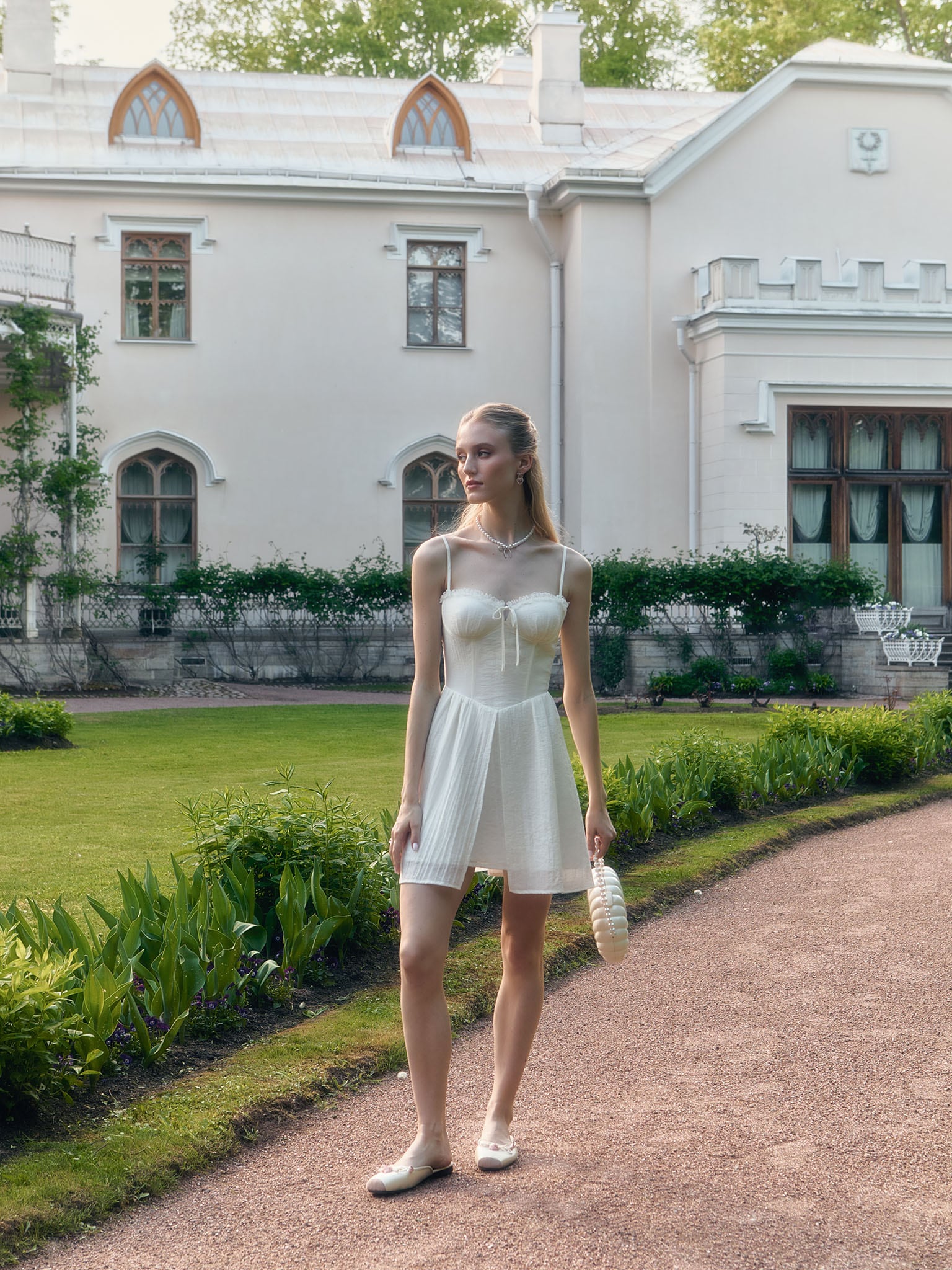 Mini strappy dress with lace ruffles on the bodice
