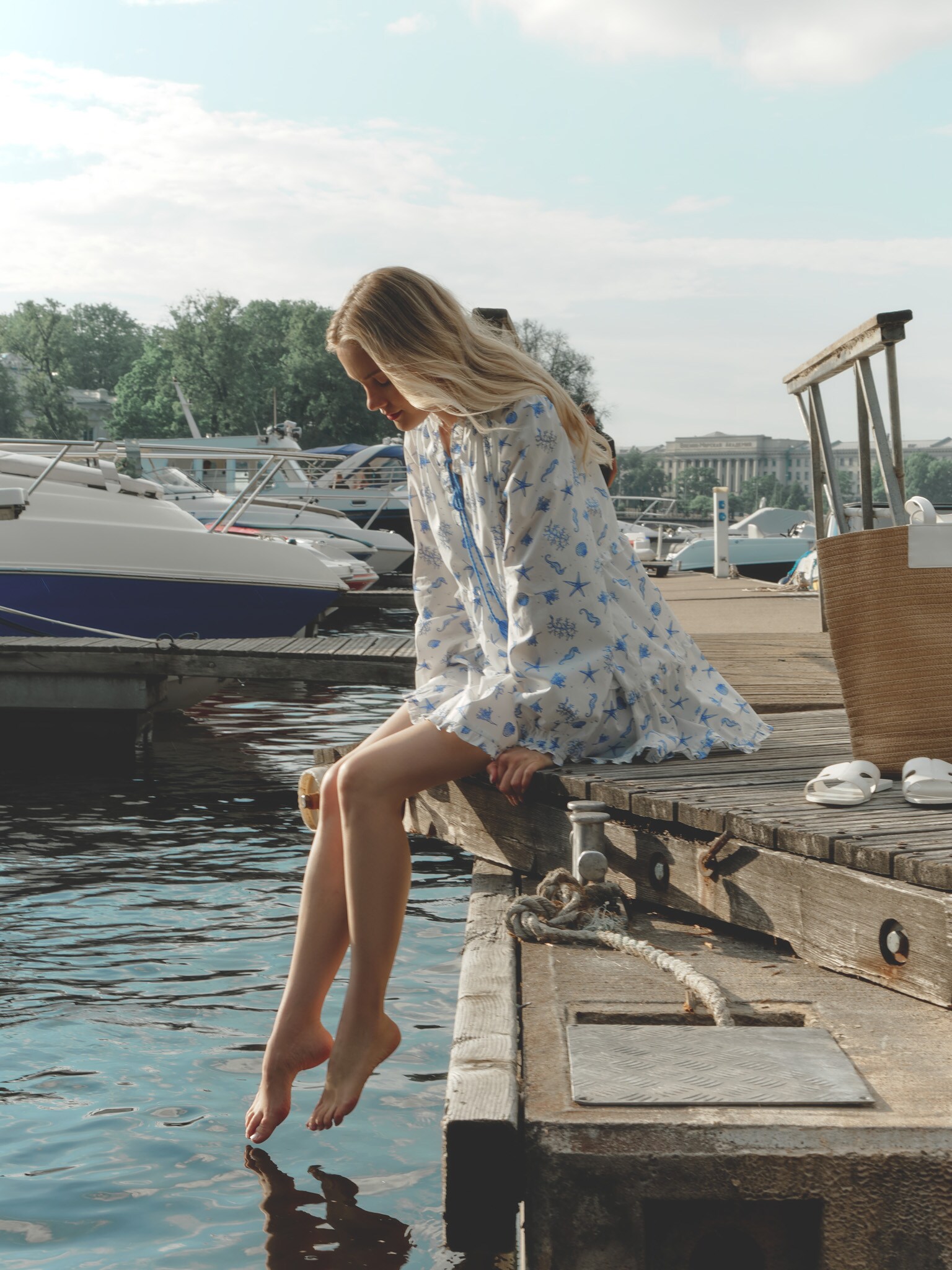 Layered mini dress with vibrant ties at the collar