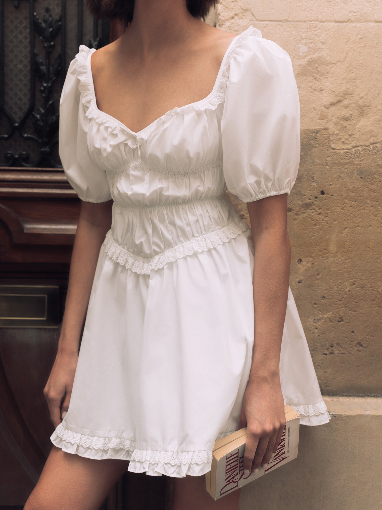 Mini dress with elasticated waist and lace ruffles