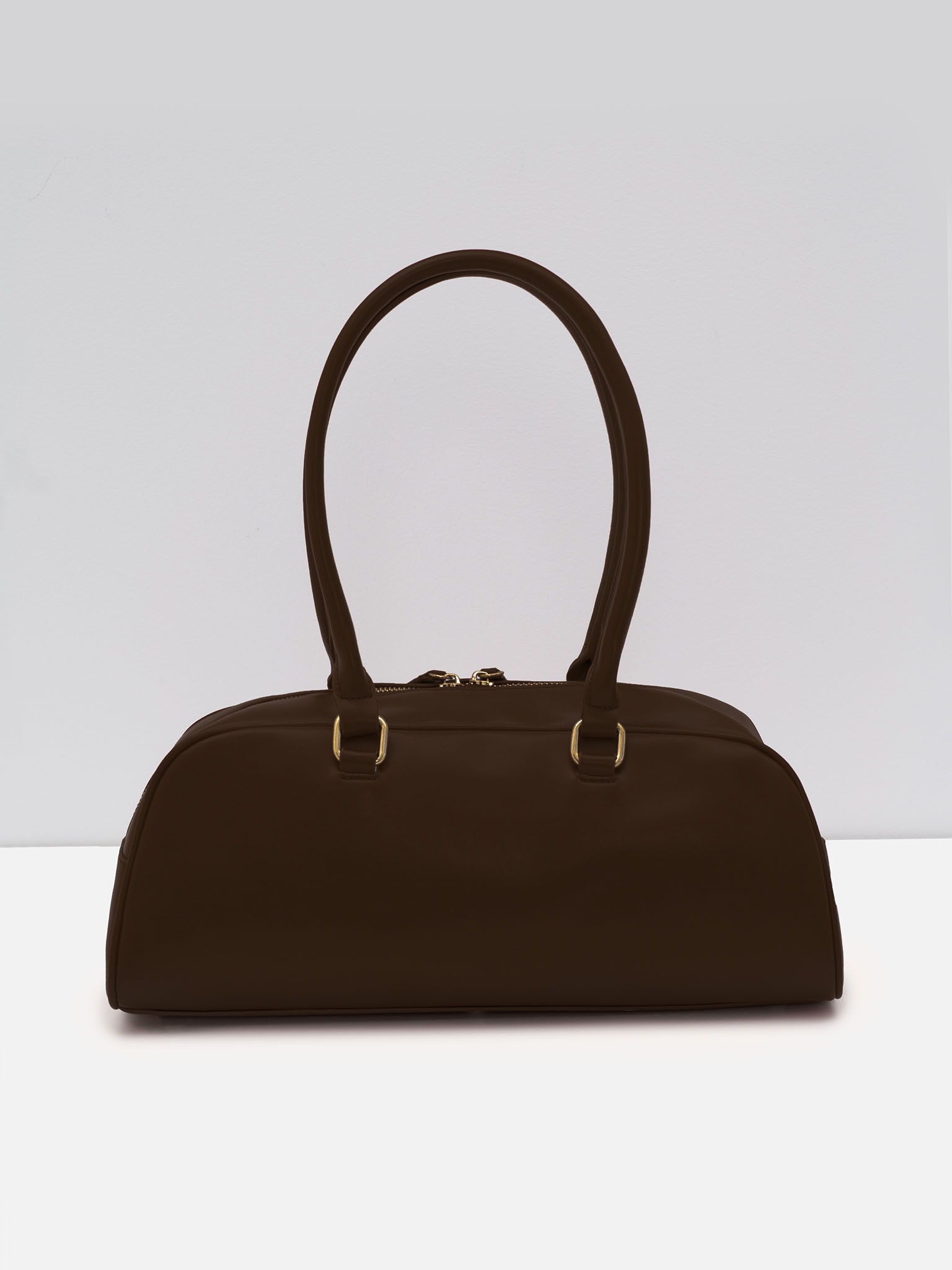 Long baguette bag with thin handles