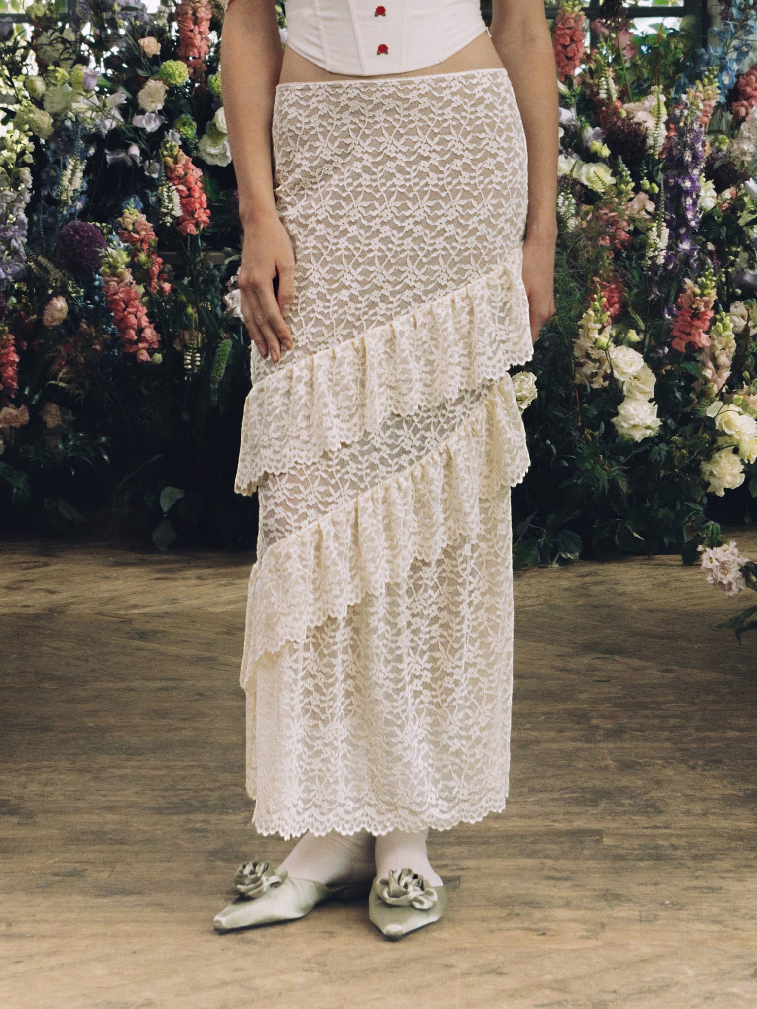 Lace maxi skirt with diagonal flounces