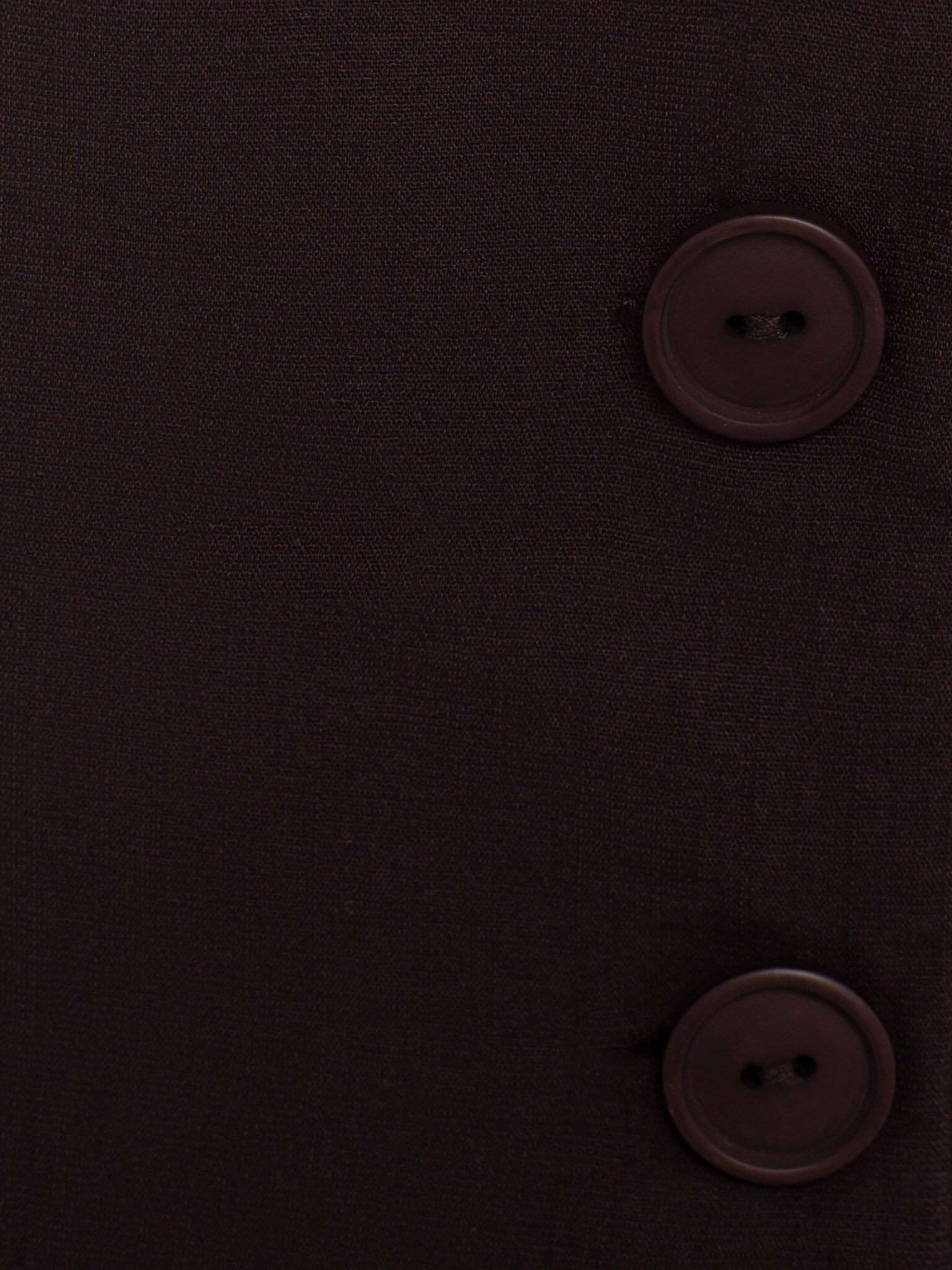 Waistcoat with round neckline and matching buttons