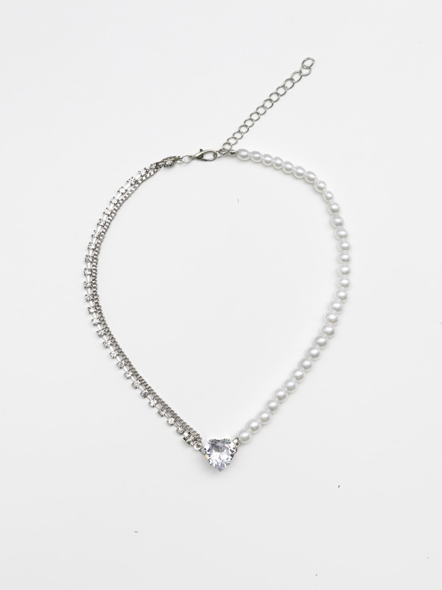 Asymmetrical necklace with heart pendant