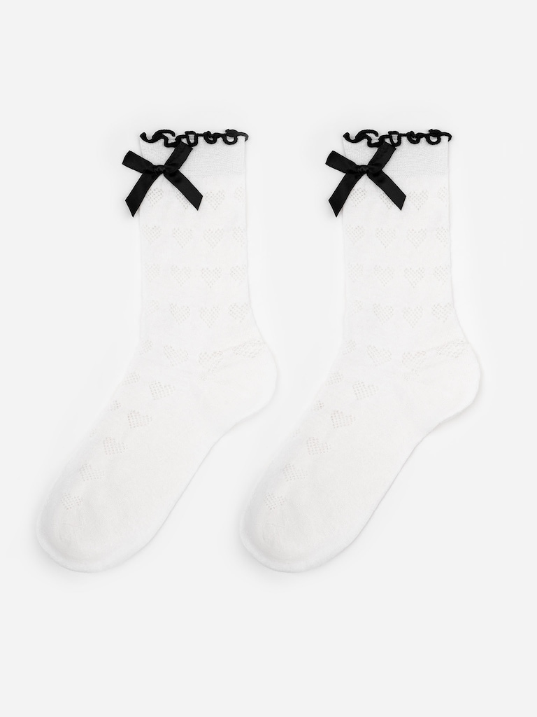 Комплект из двух пар носков с орнаментом и контрастными бантами