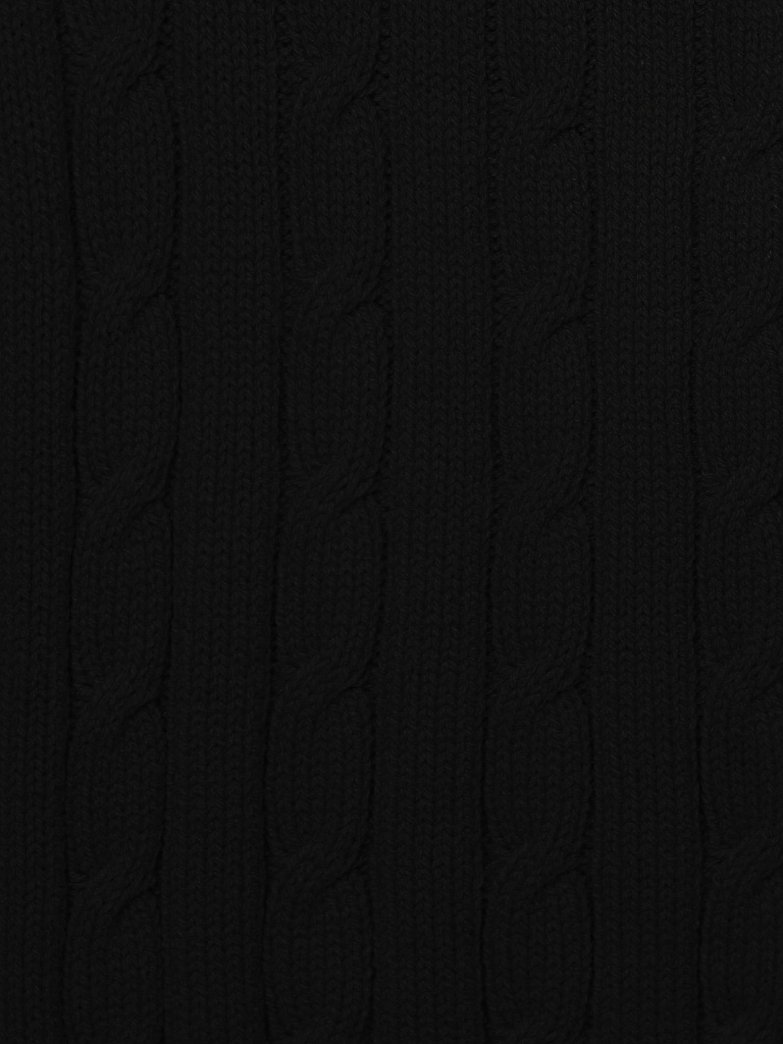 Укороченный кардиган вязки косами