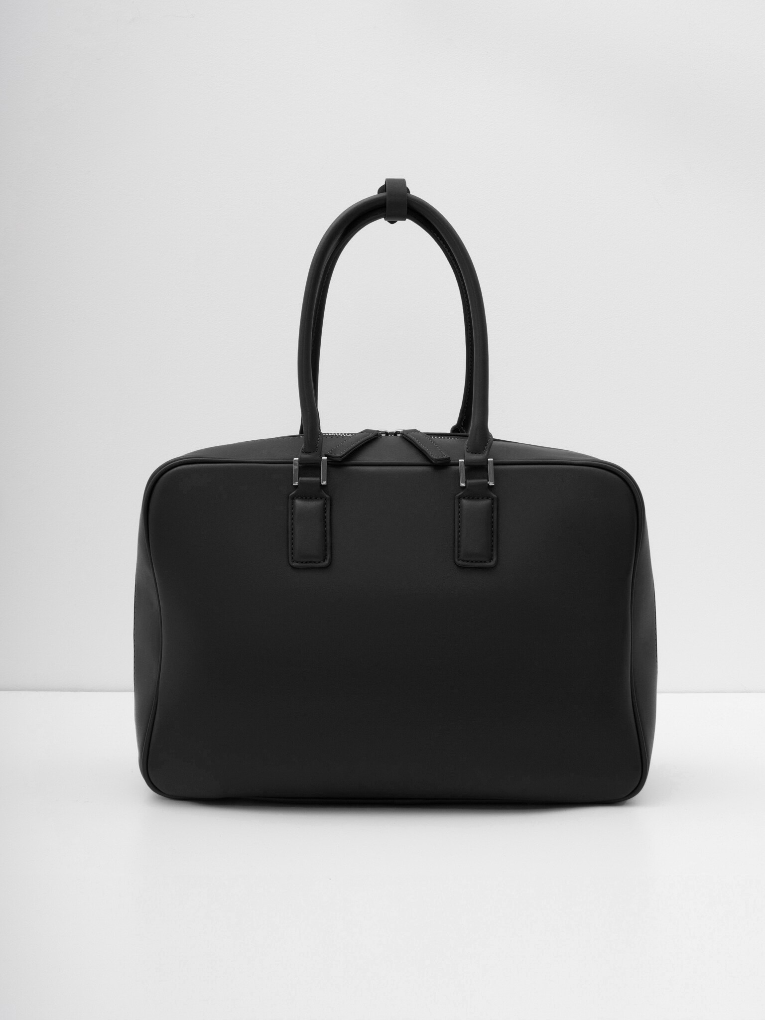 Rectangular eco-leather bag with short handles