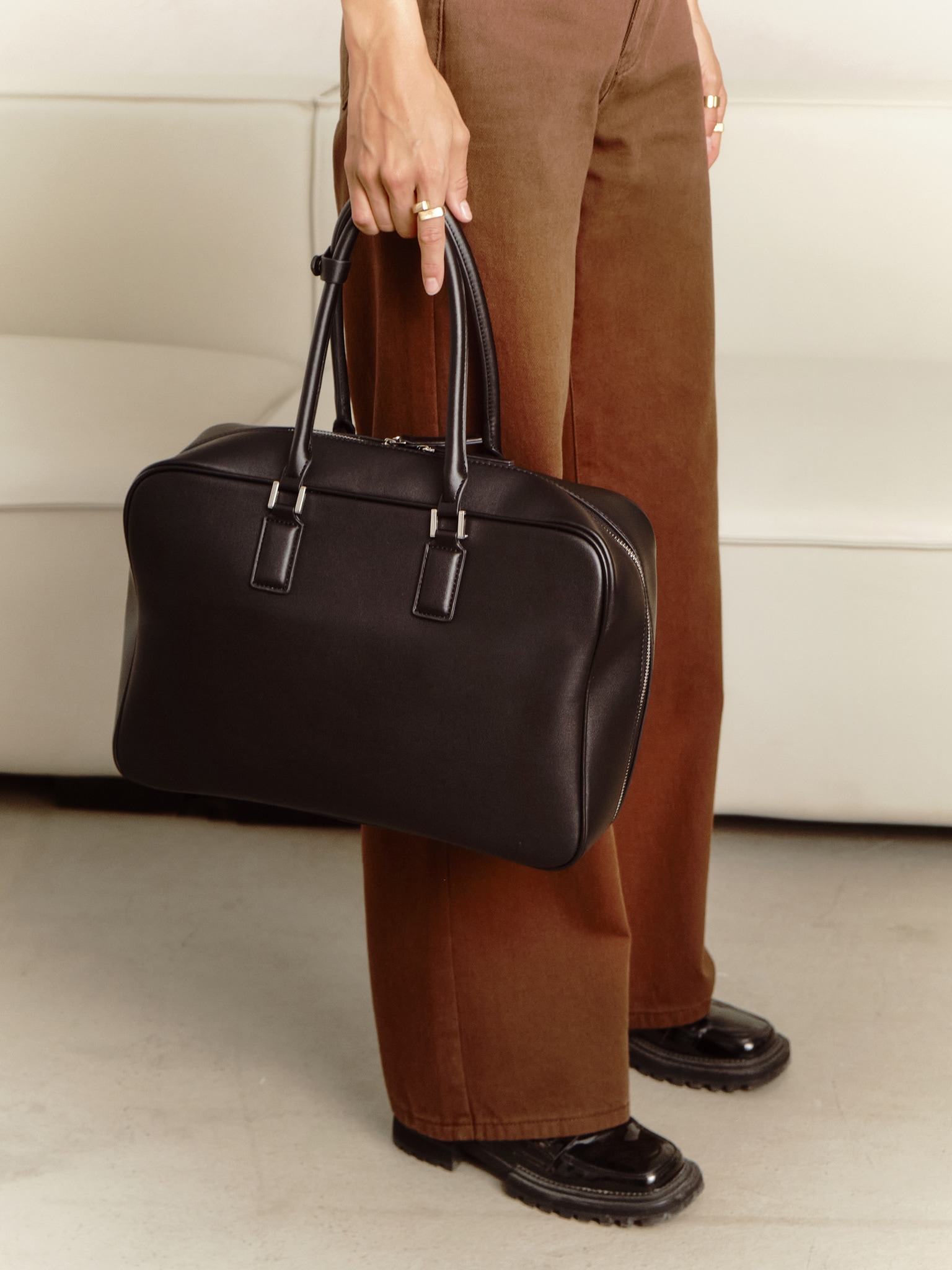 Rectangular eco-leather bag with short handles