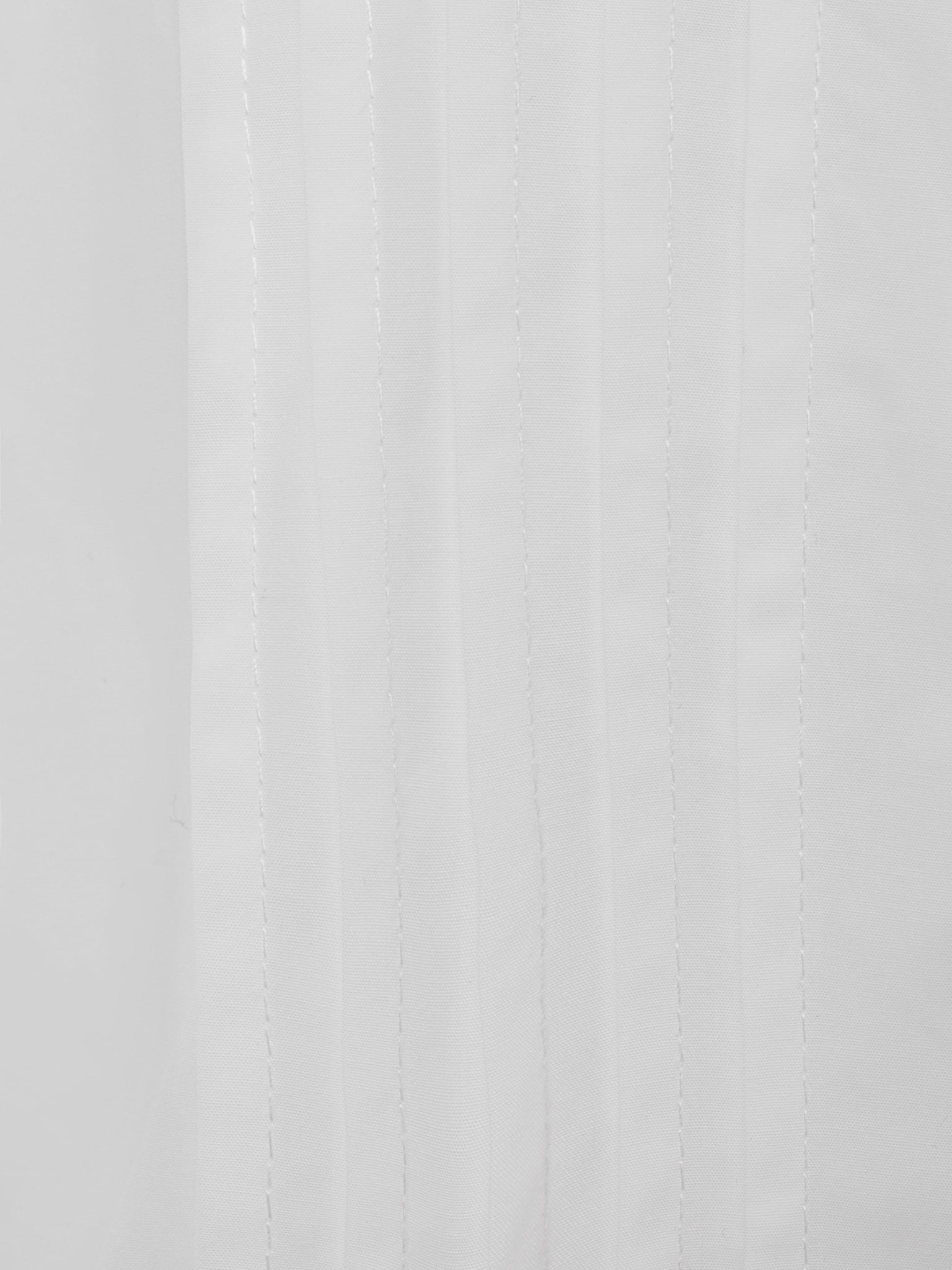 Shirt with pleated cuffs and metal buttons