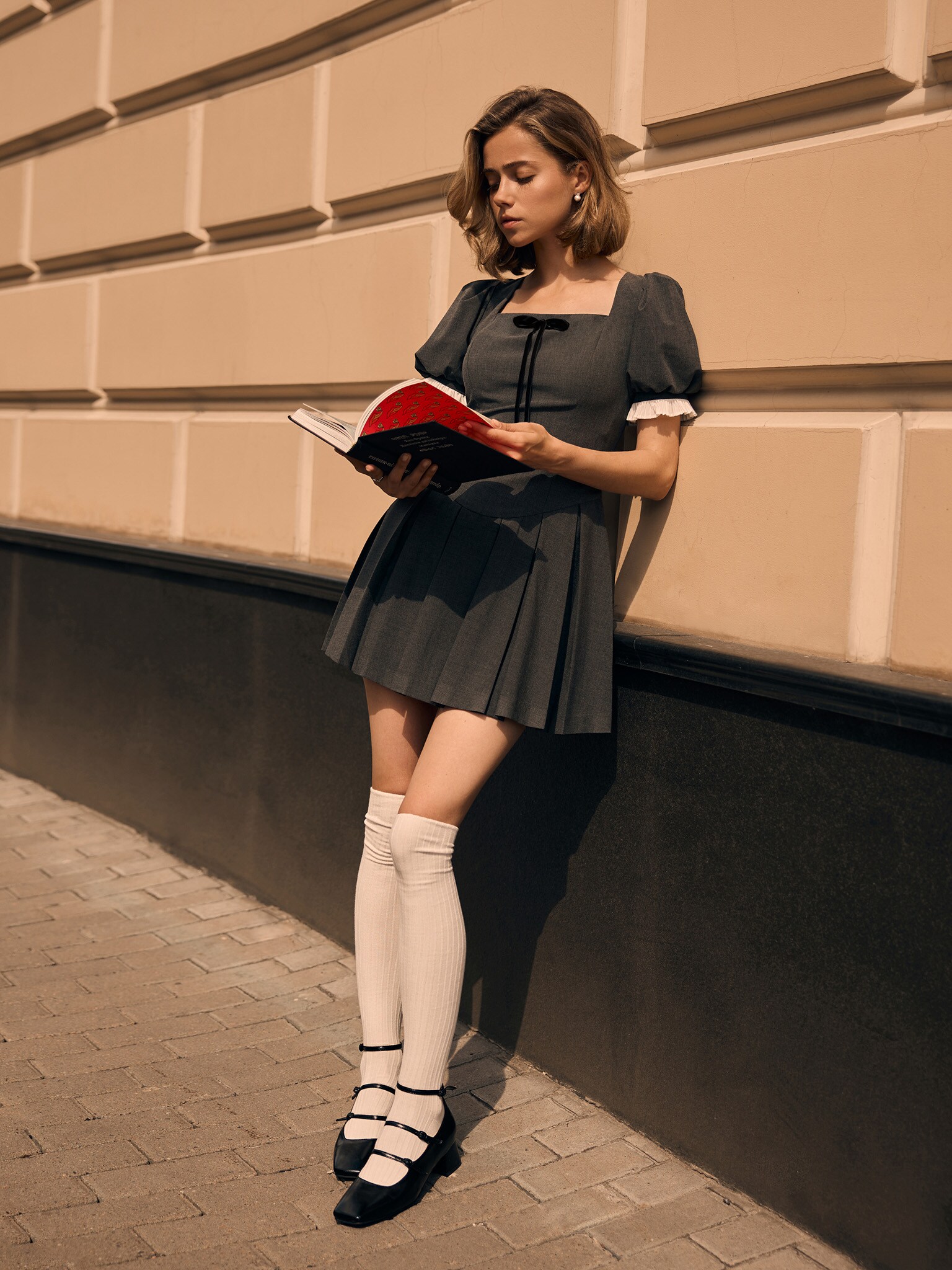 Mini dress with puff sleeves and pleated cuffs