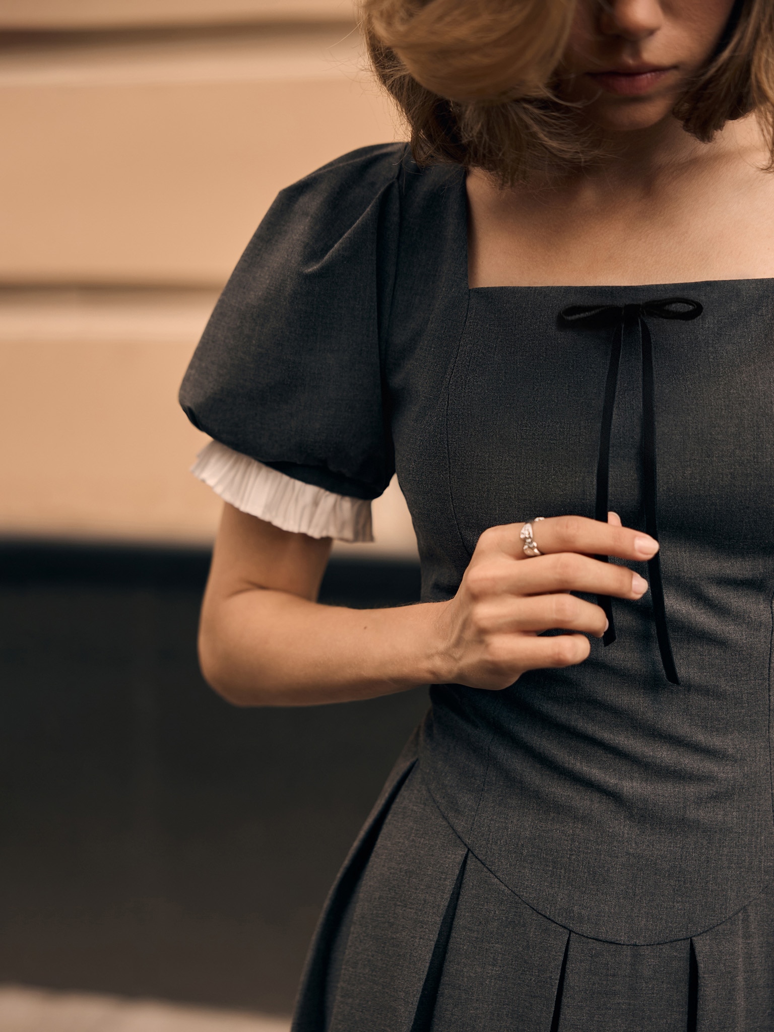 Mini dress with puff sleeves and pleated cuffs