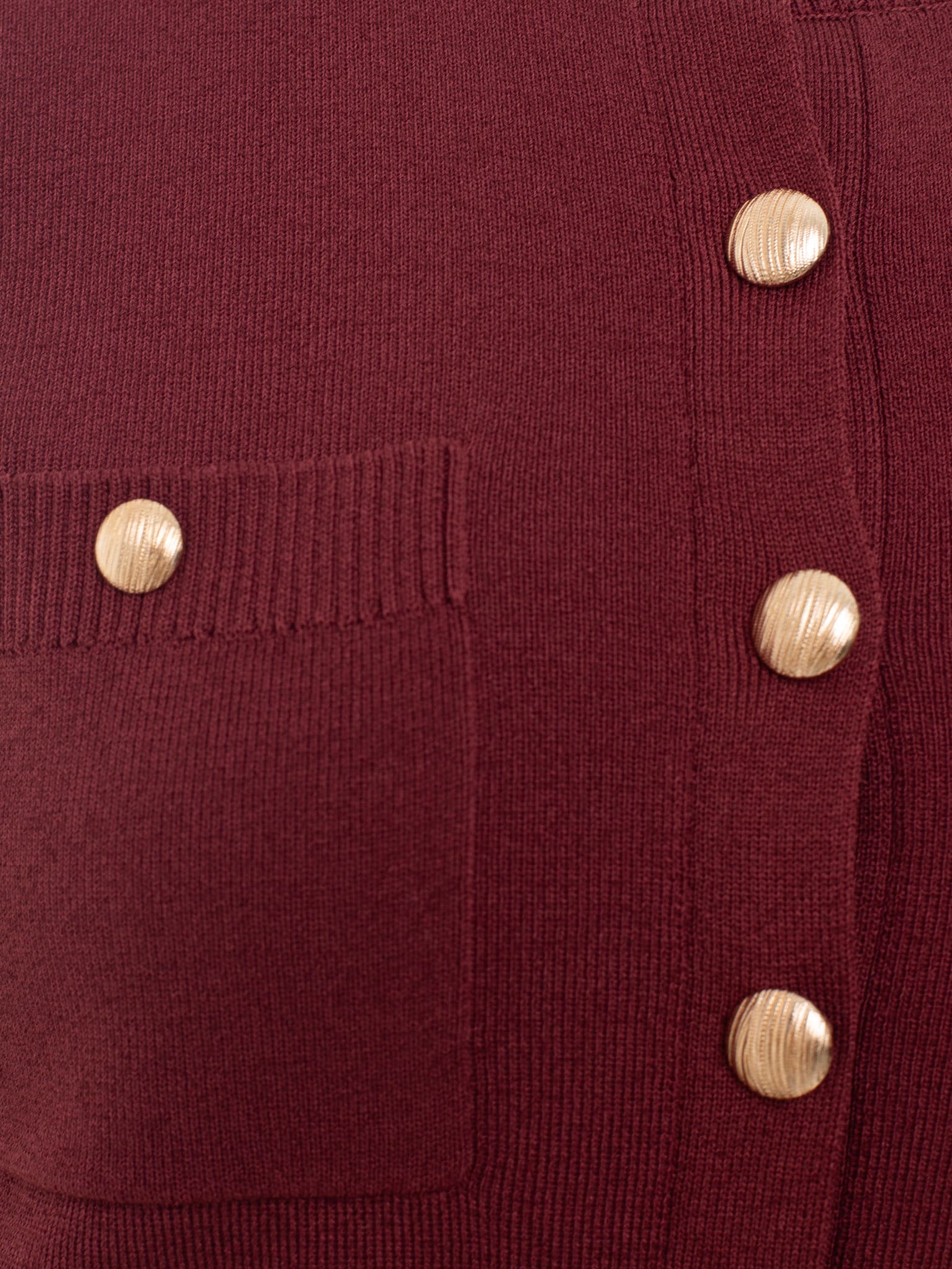 Short-sleeved knitted cardigan with golden fittings