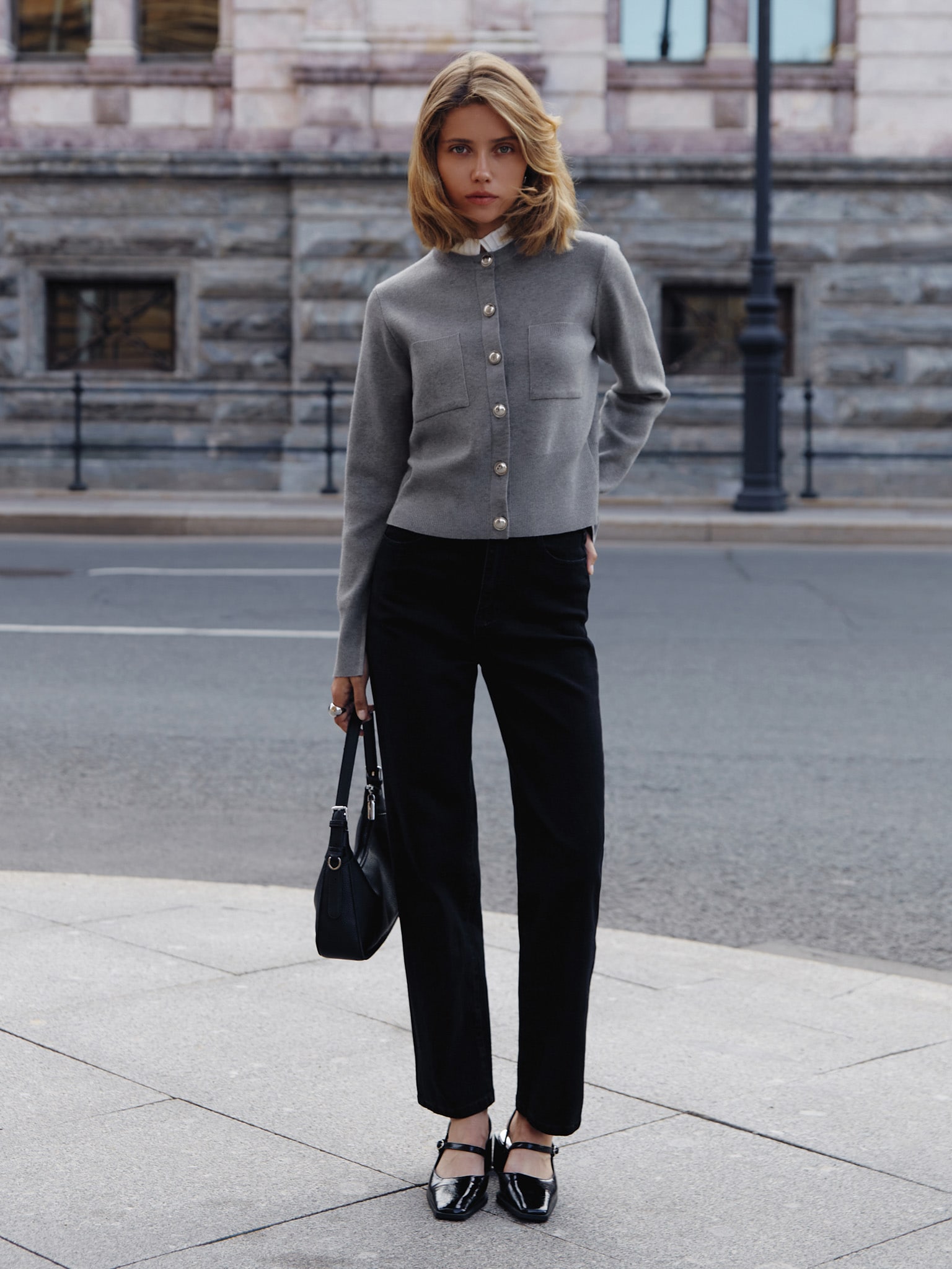 Cardigan with pleated insert on the collar