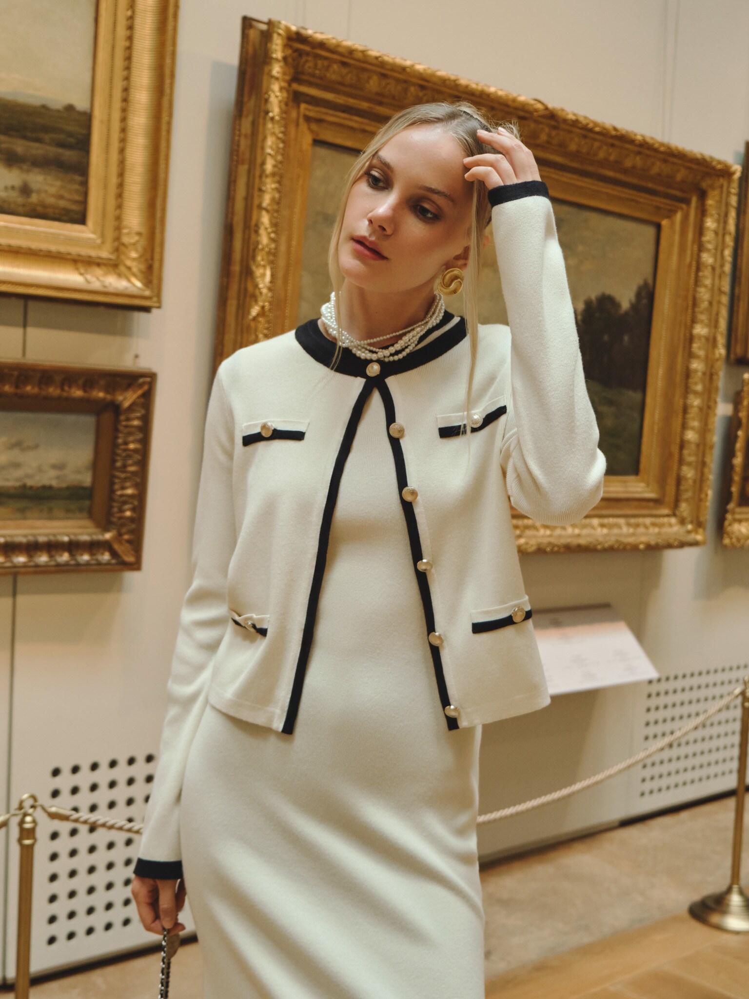 Sleeveless knitted midi dress with contrasting details