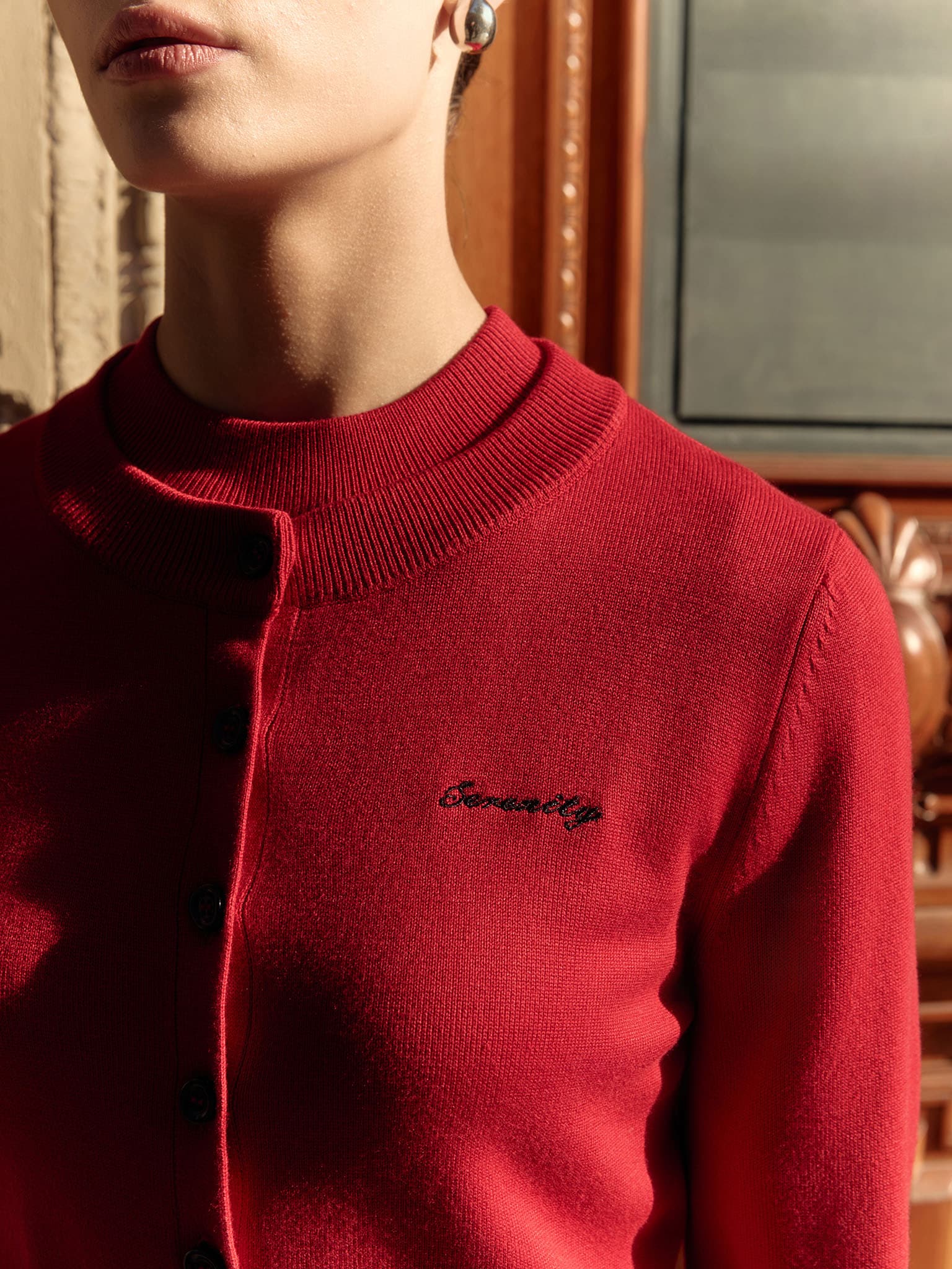 Knitted cardigan with chest embroidery