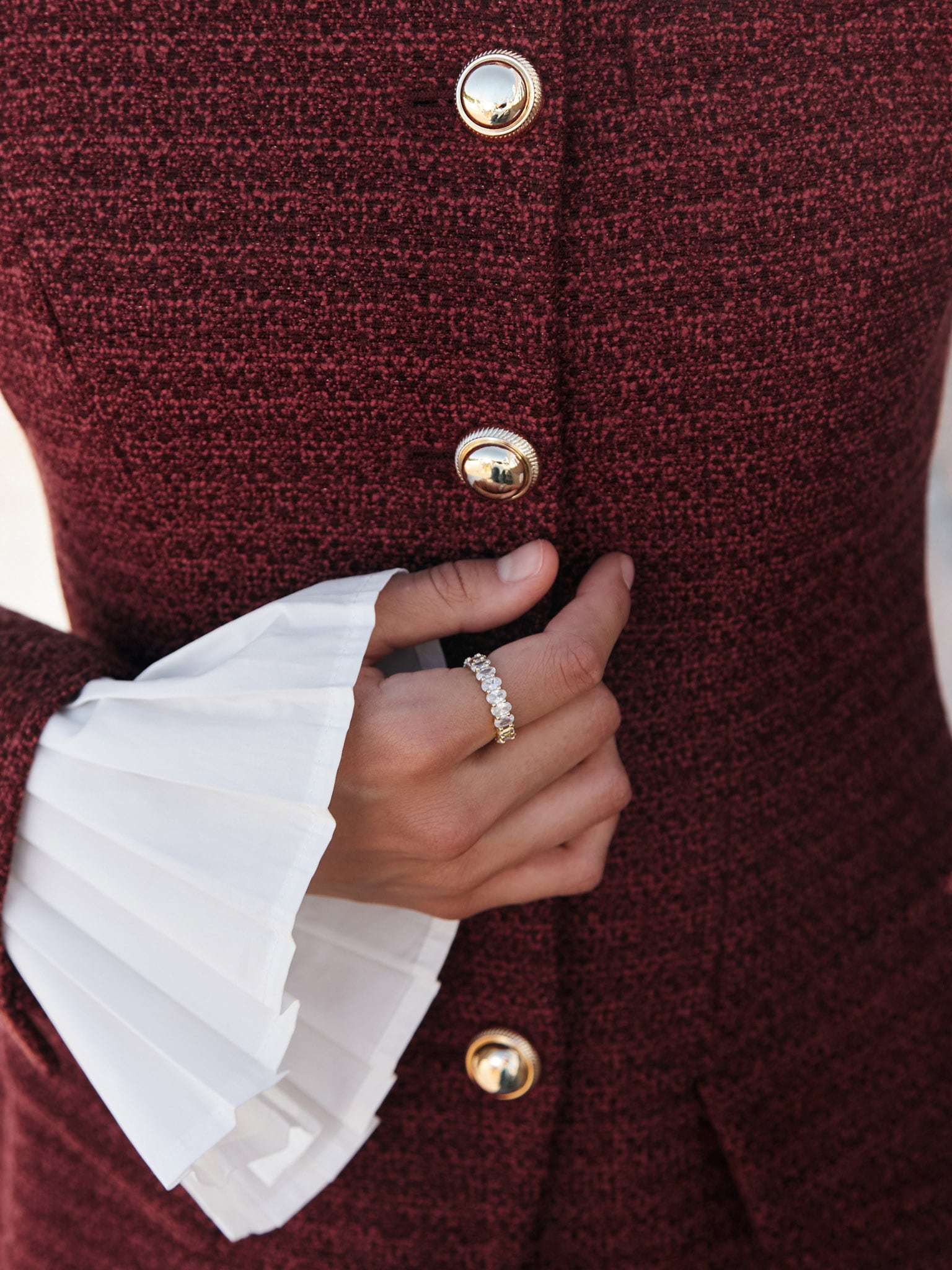 Long tweed jacket with metal buttons