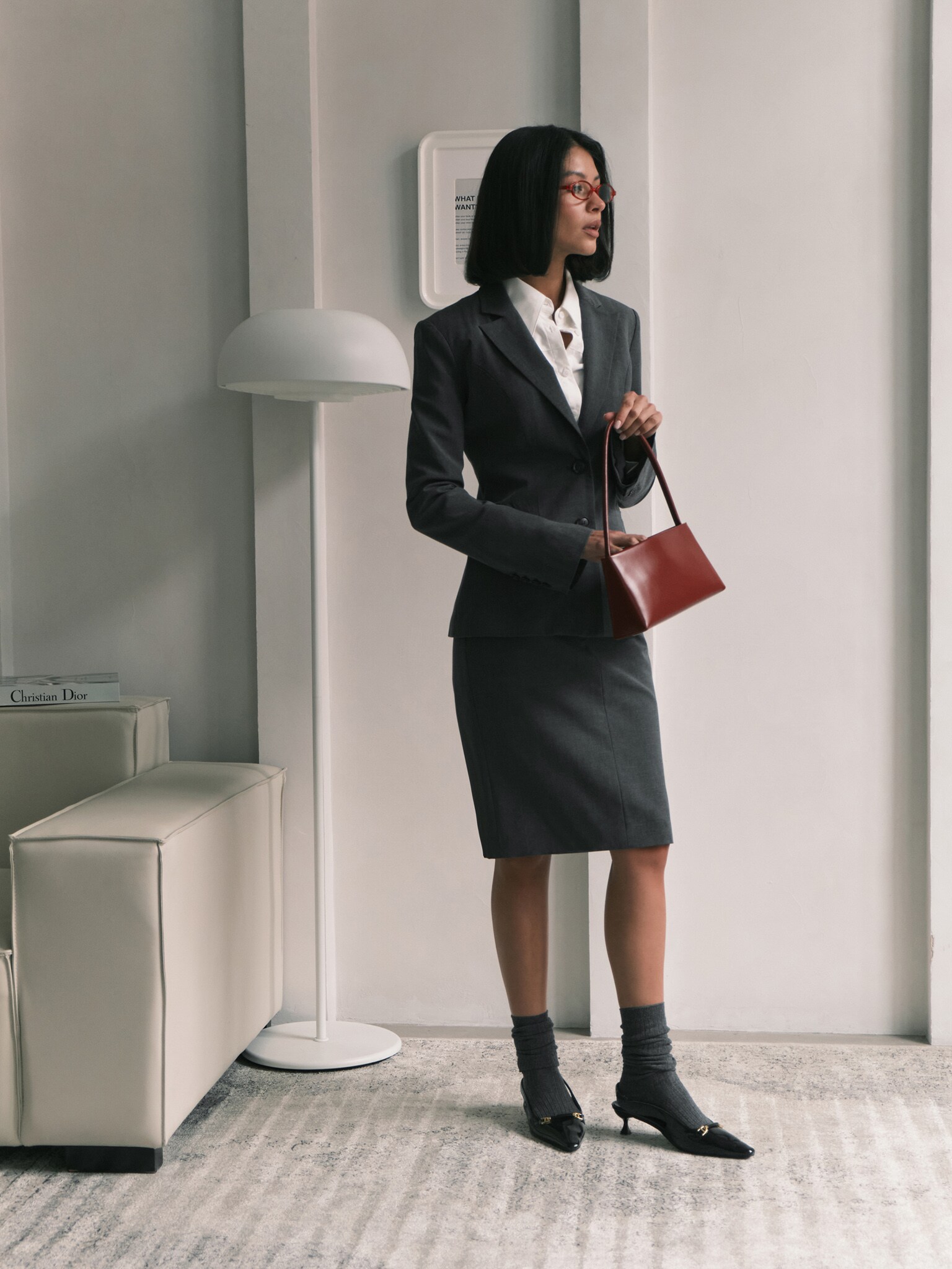 Knee-length mini skirt with imitation side pockets and a