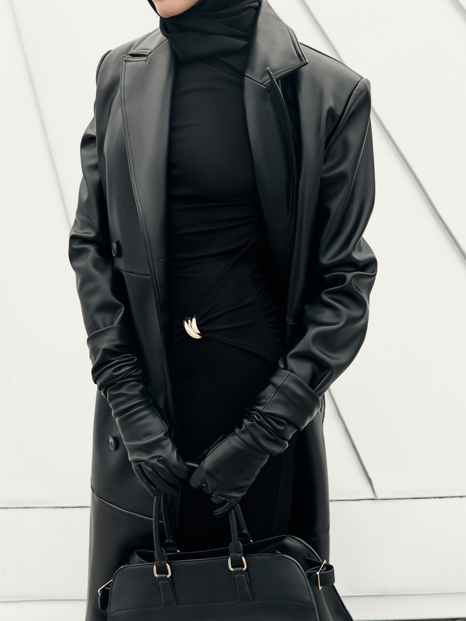 Eco-leather maxi trench with horizontal seams and tonal belt