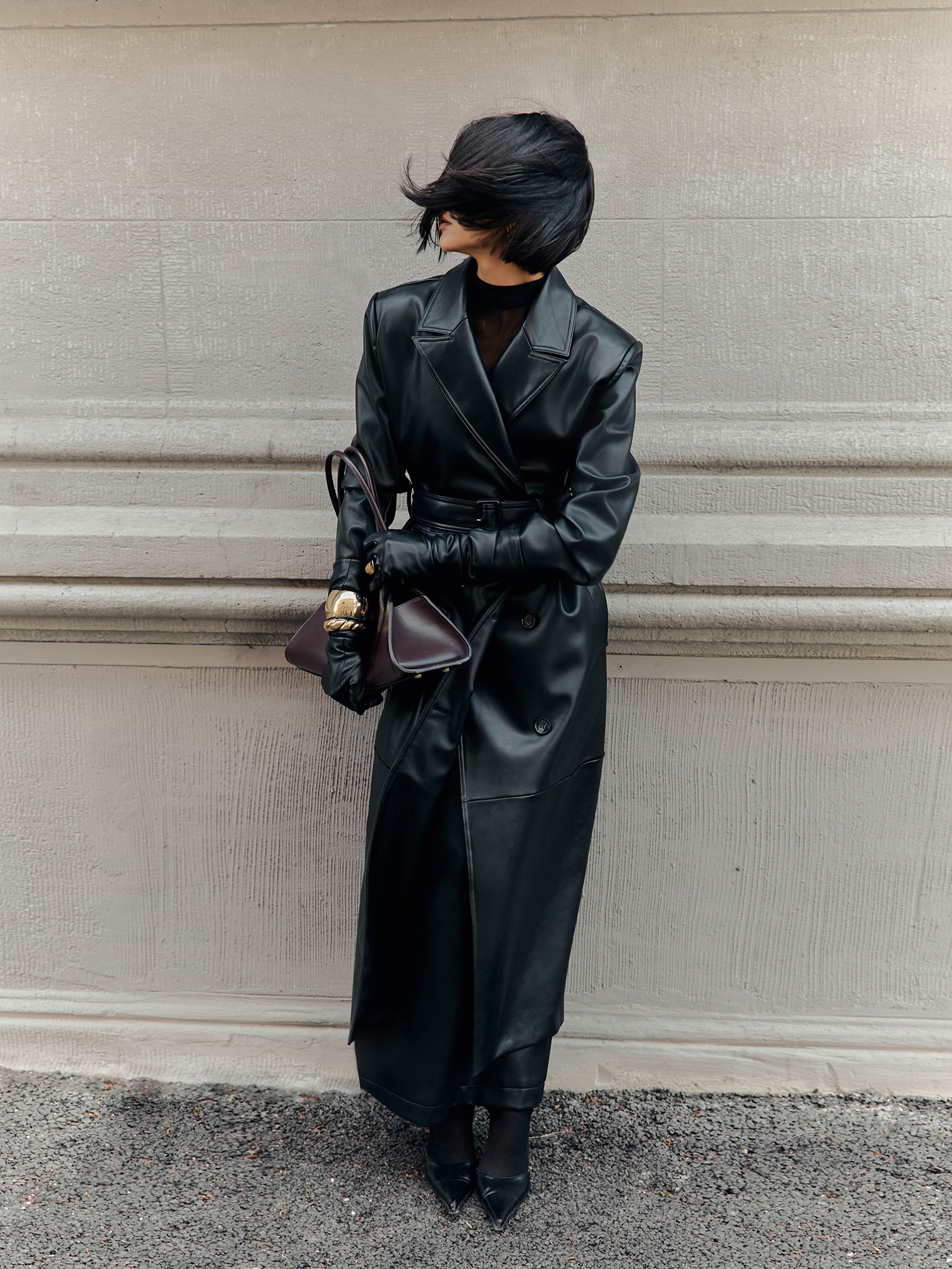 Eco-leather maxi trench with horizontal seams and tonal belt