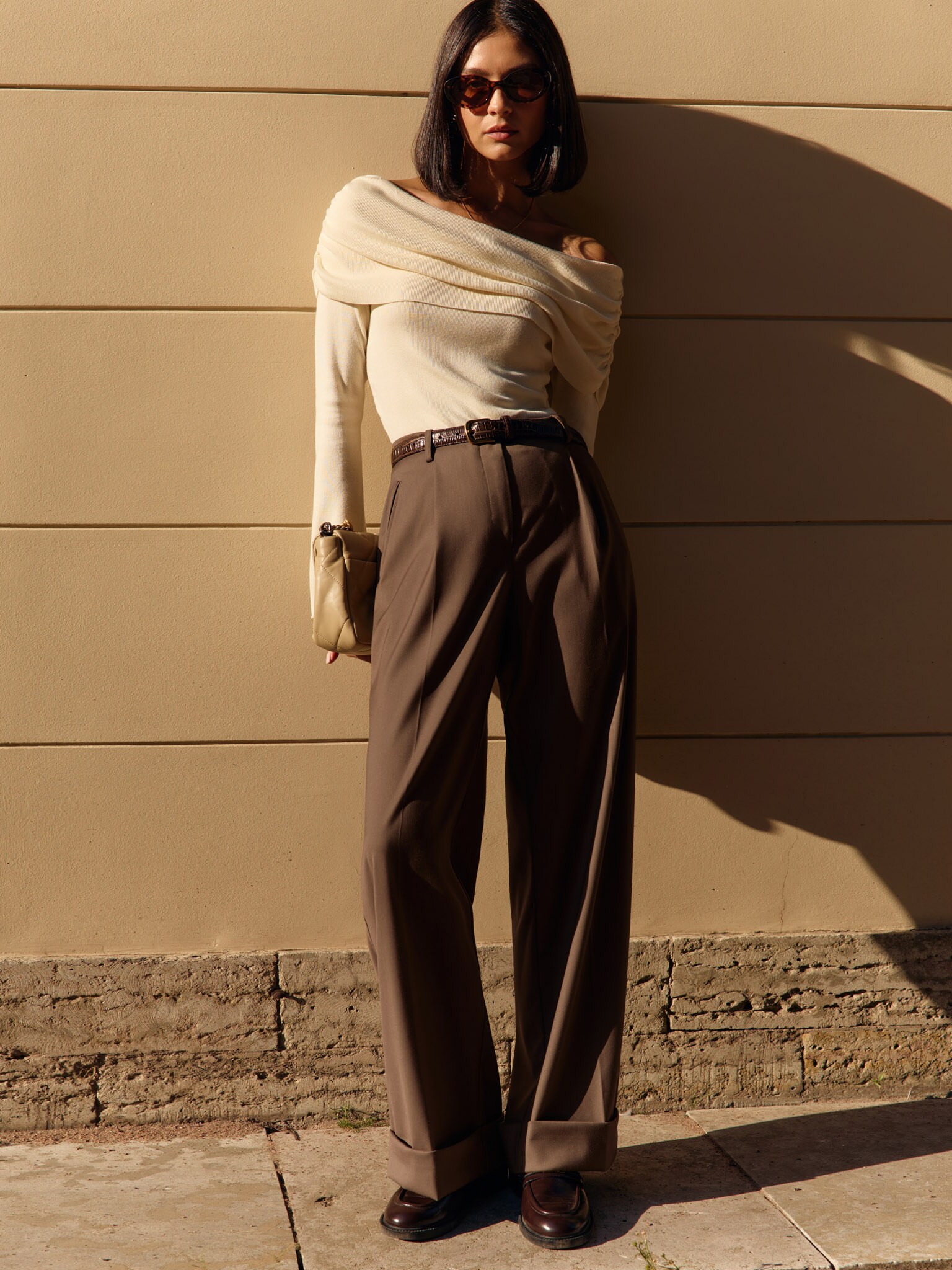 Suiting trousers with waist pleats and lapels