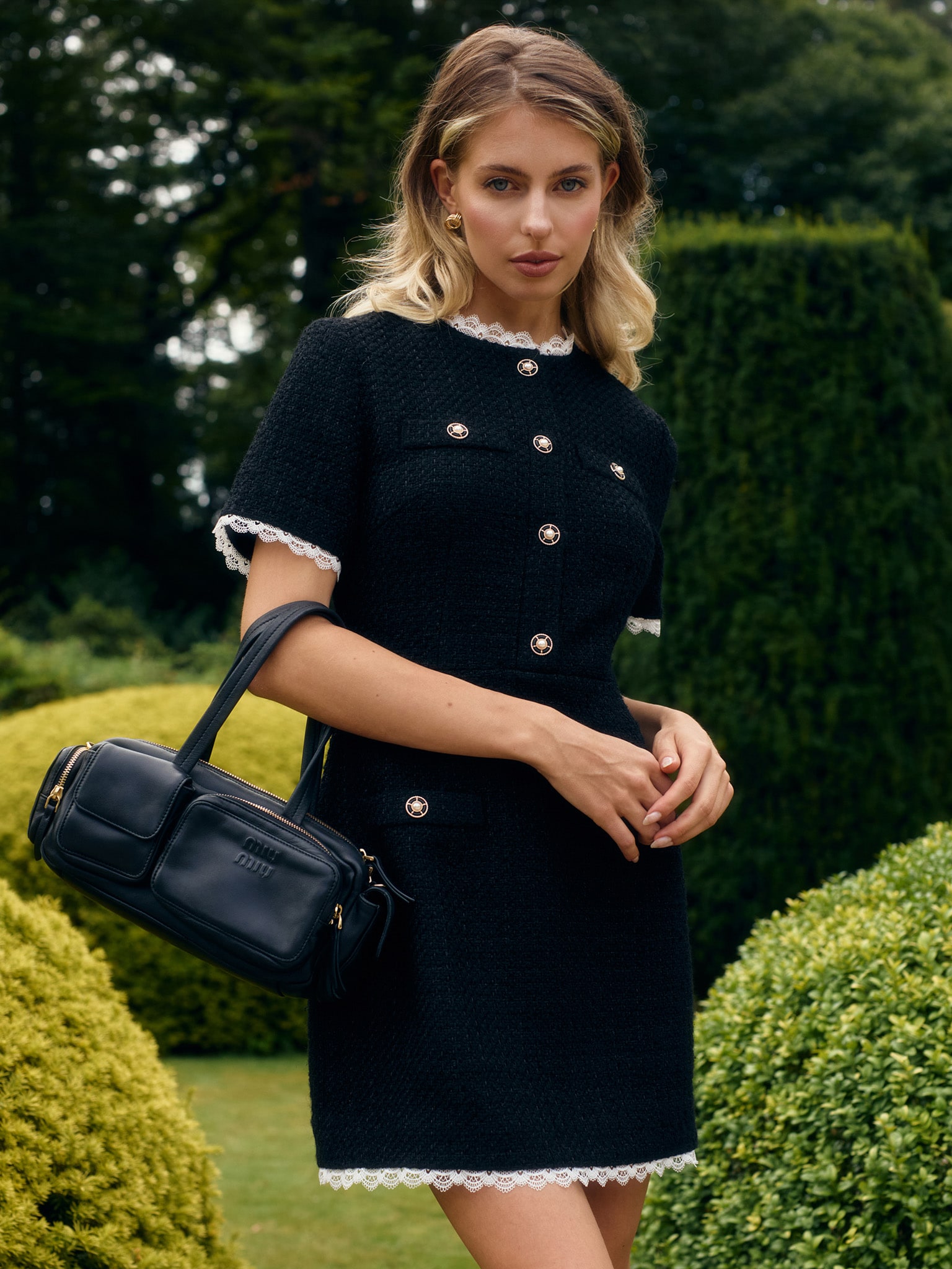 Tweed mini dress with openwork inserts